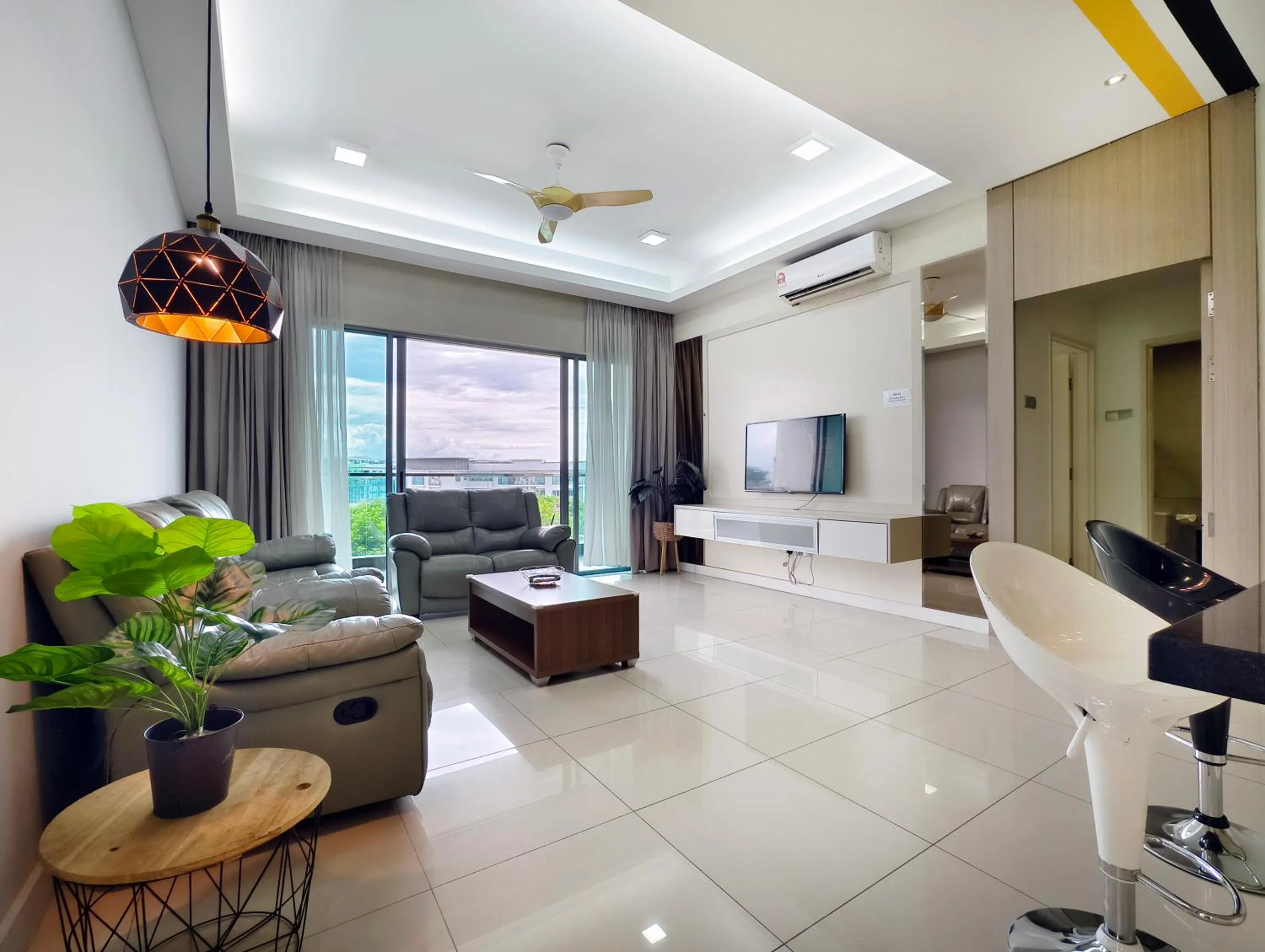 Communal lounge/ TV room in AJ Suites @ Loft Imago KK