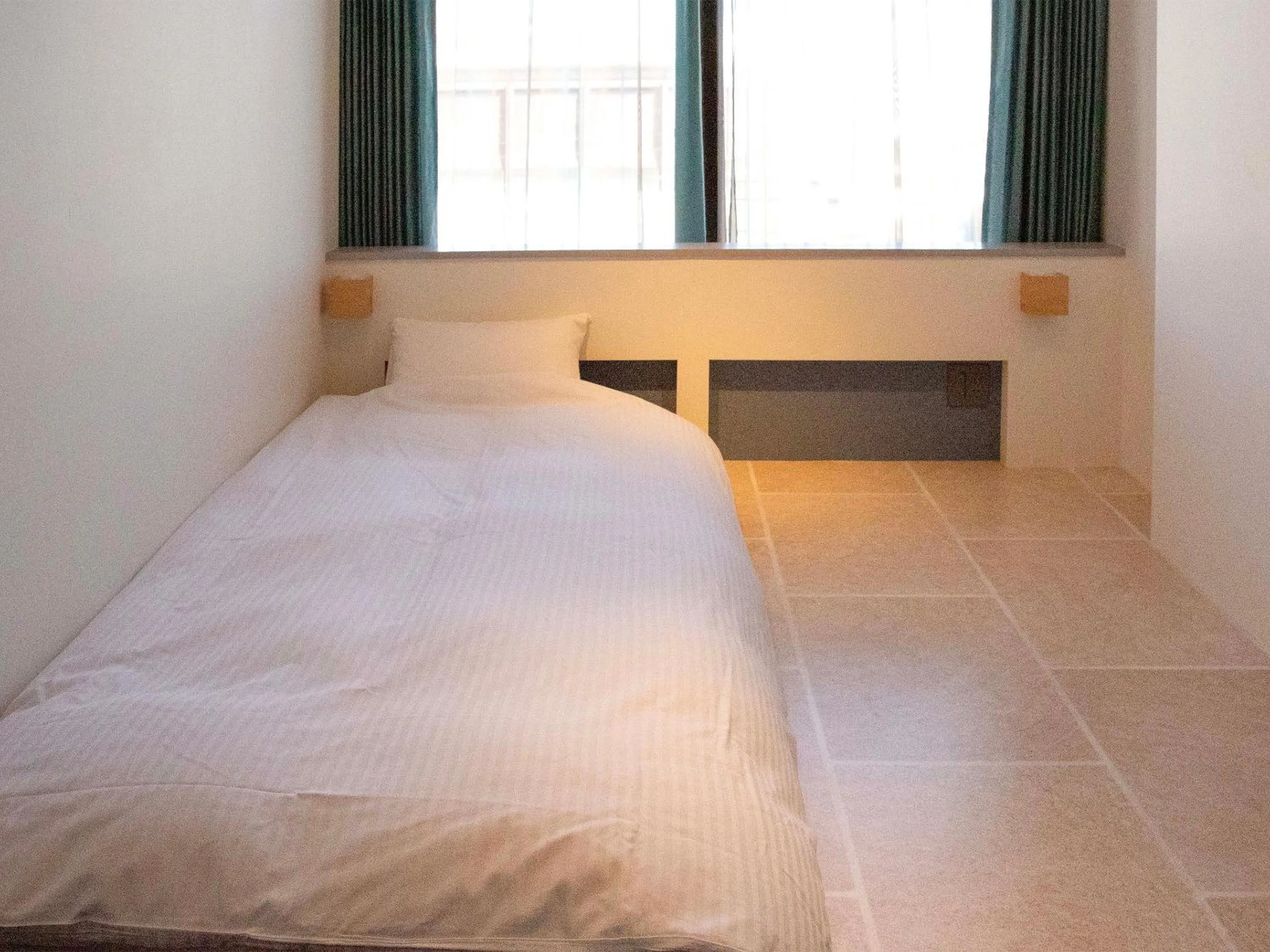 Photo of the whole room, Bed in the circle apartment