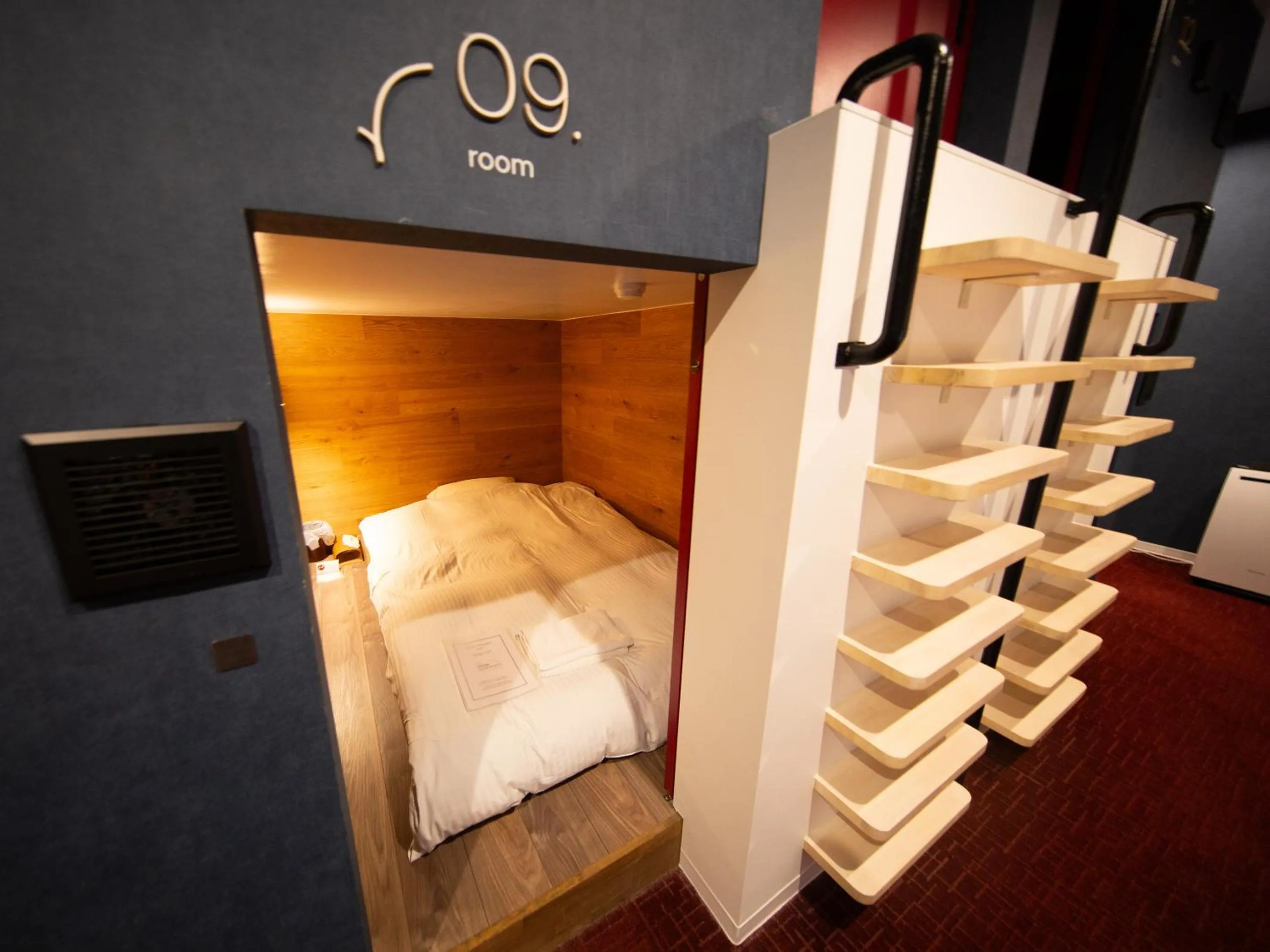 Photo of the whole room, Bed in the circle apartment