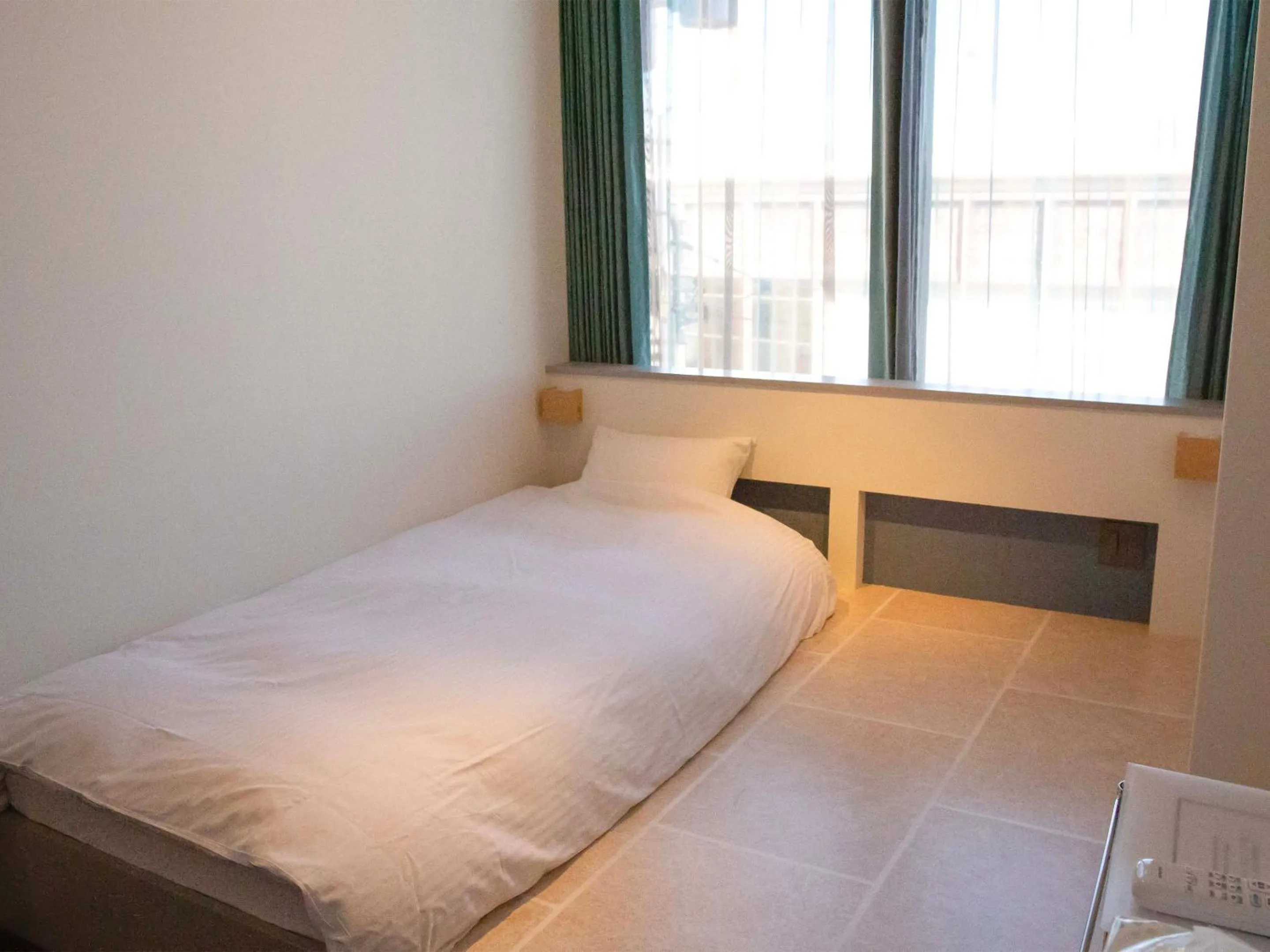 Photo of the whole room, Bed in the circle apartment