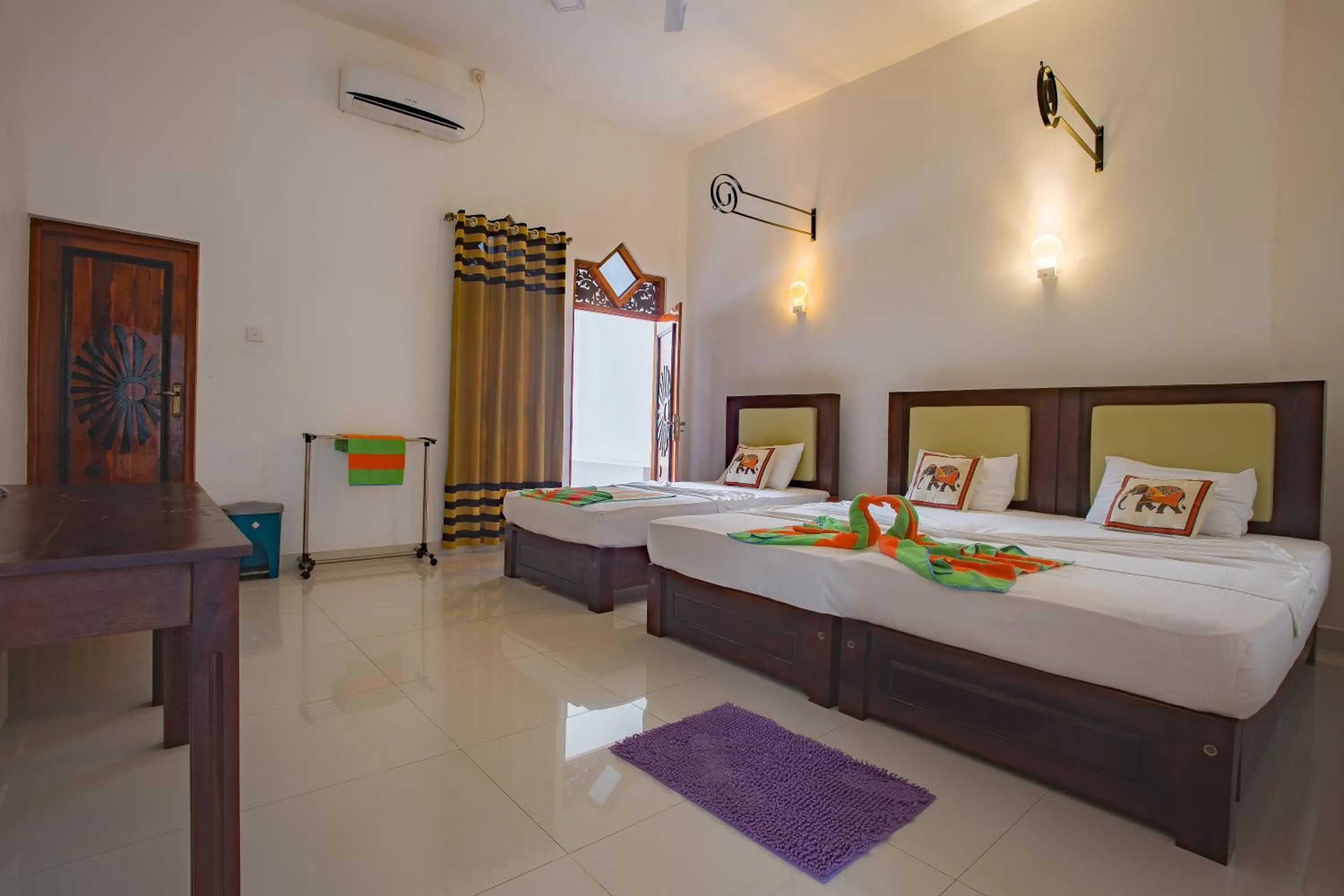 Bed in Peacock Reach Hotel