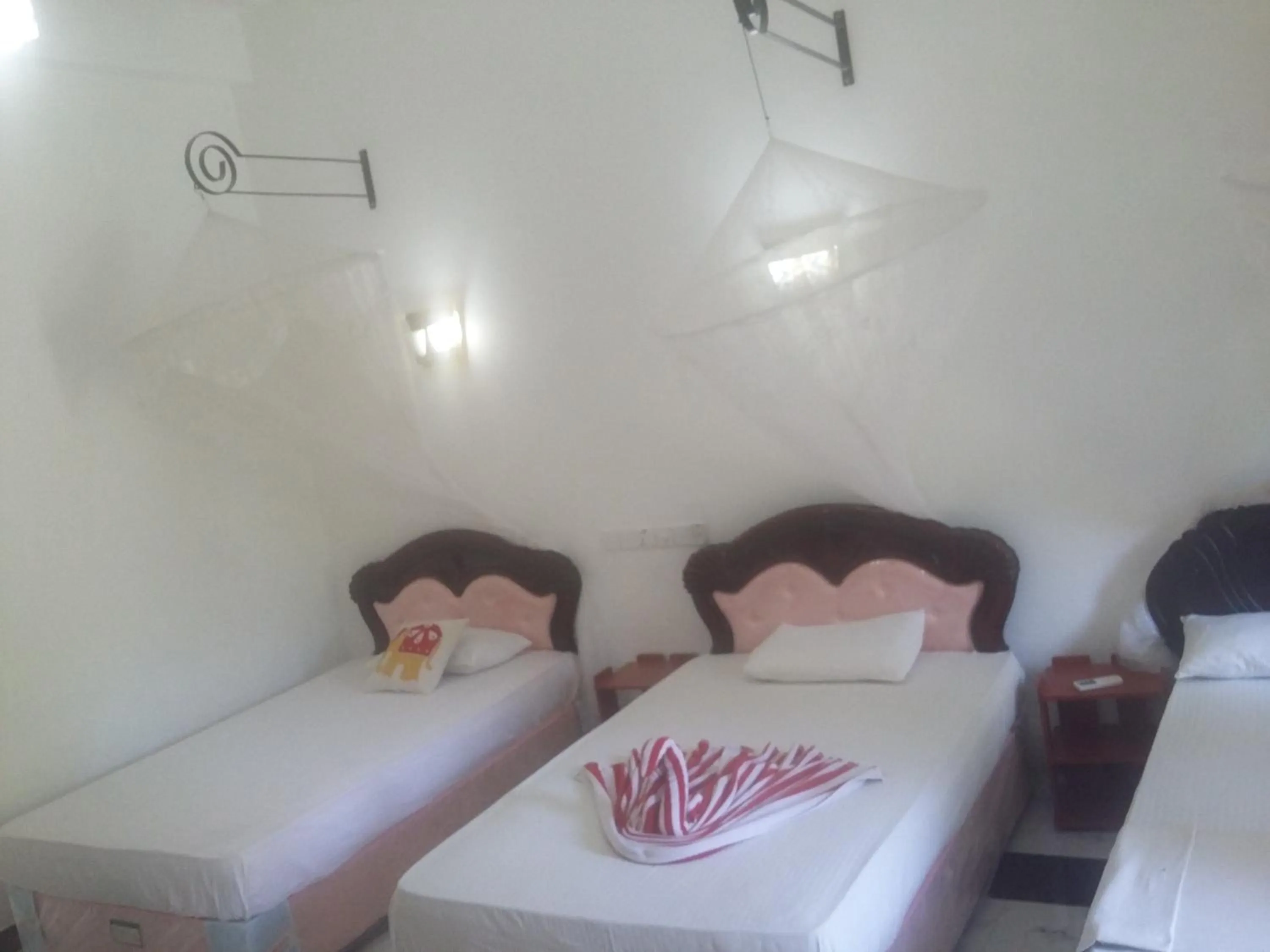 Bed in Peacock Reach Hotel