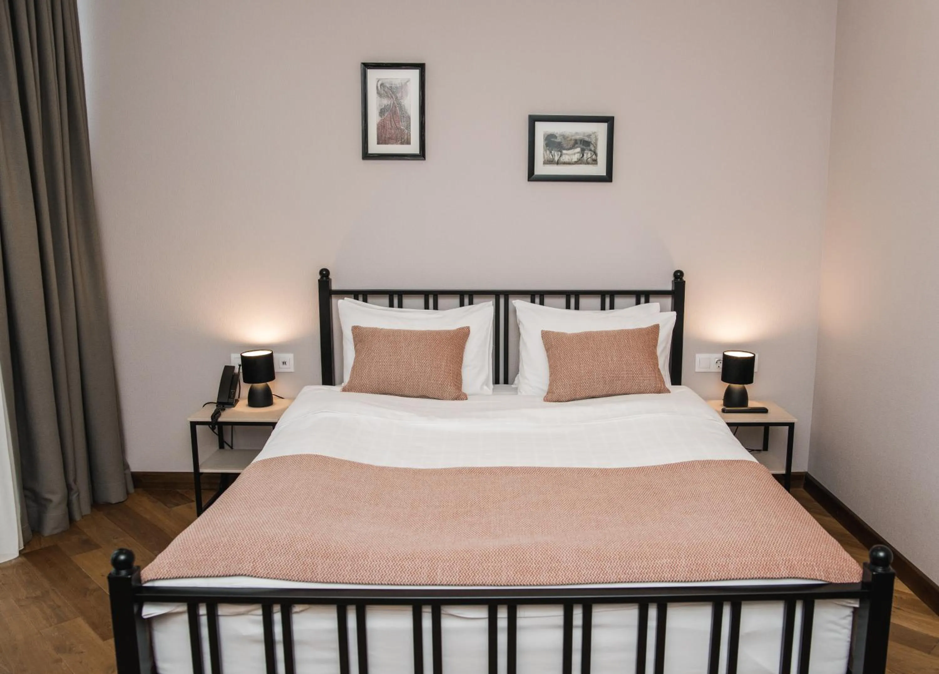 Photo of the whole room, Bed in Makmani Boutique Hotel by DNT Group