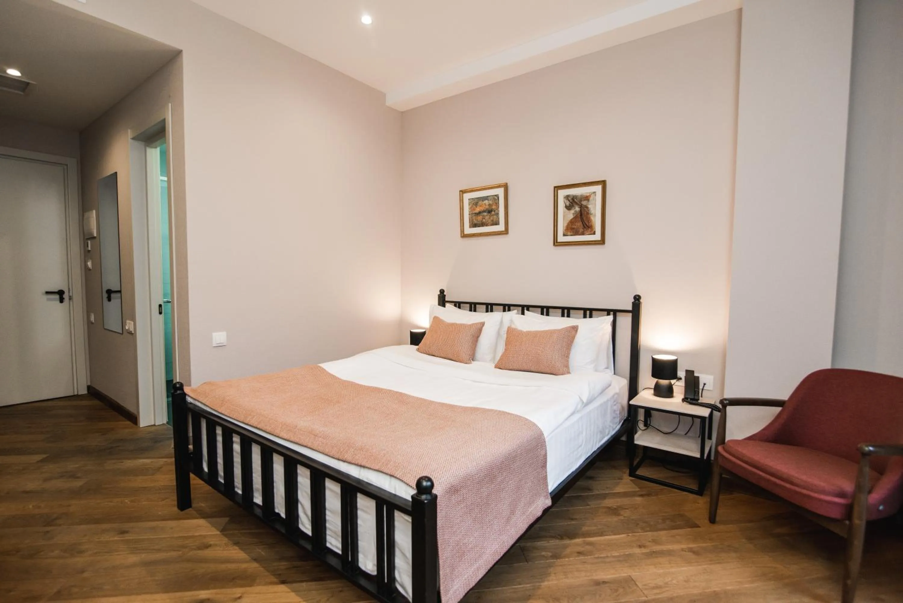 Photo of the whole room, Bed in Makmani Boutique Hotel by DNT Group