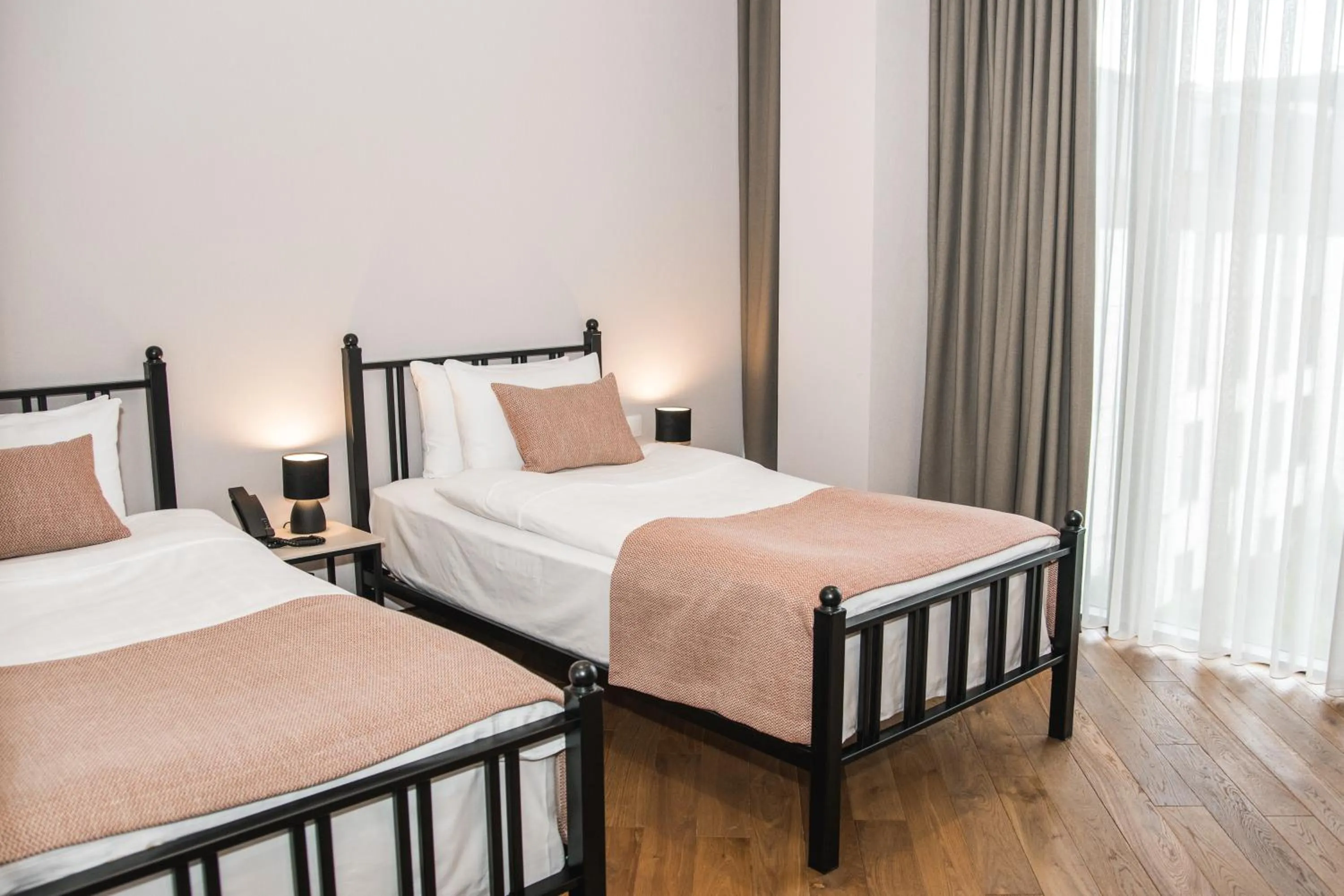 Bed in Makmani Boutique Hotel by DNT Group