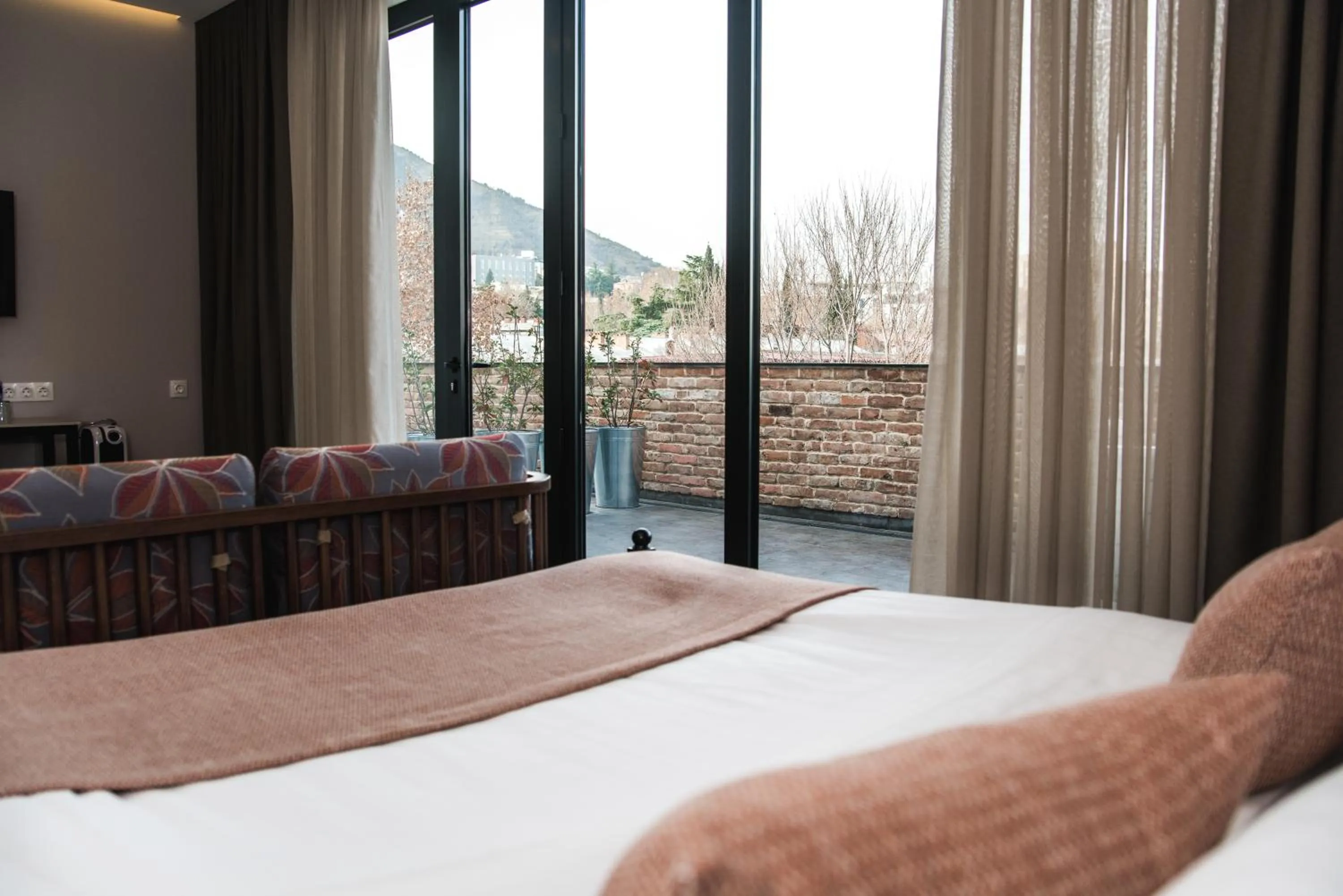 Bed in Makmani Boutique Hotel by DNT Group