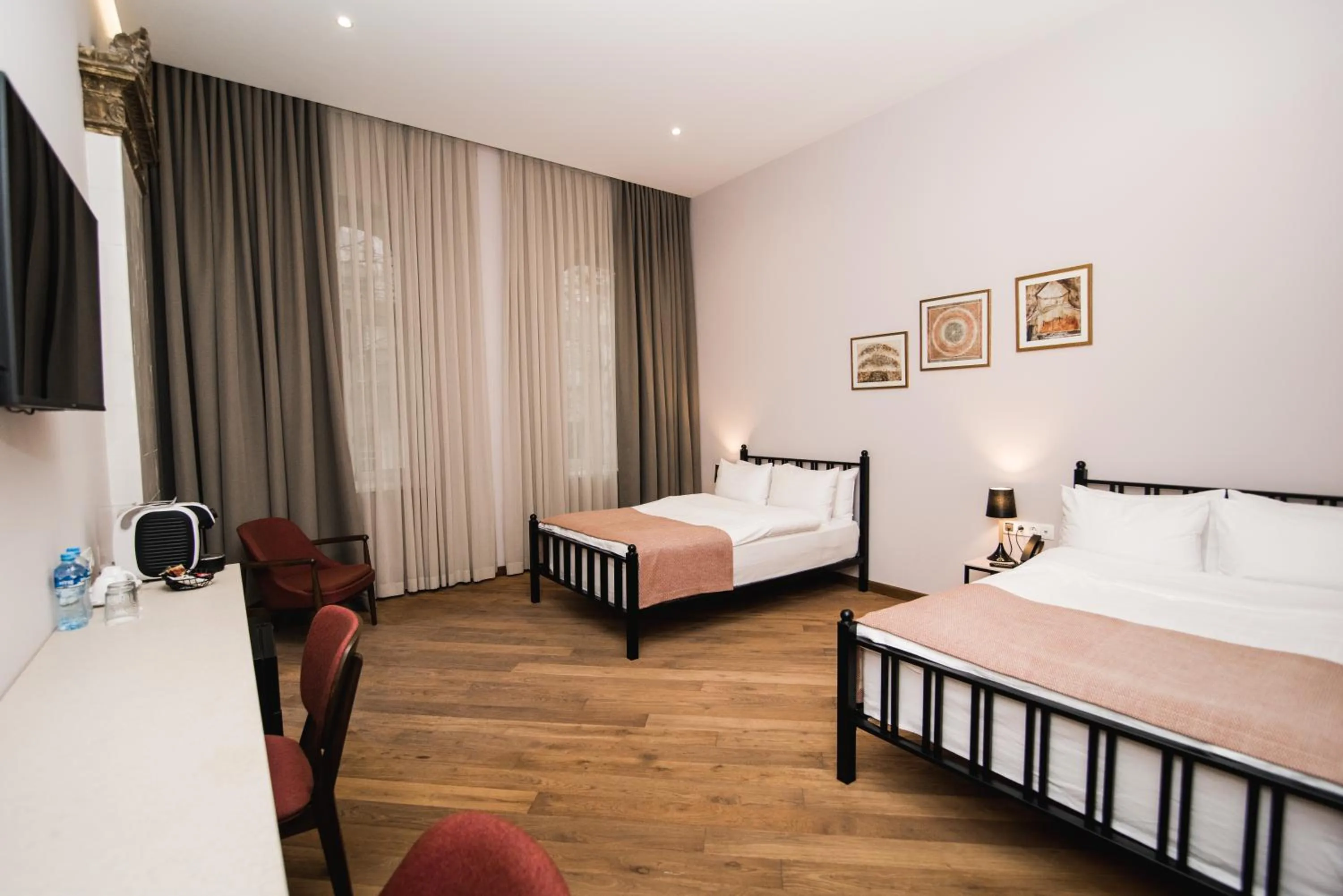 Photo of the whole room, Bed in Makmani Boutique Hotel by DNT Group