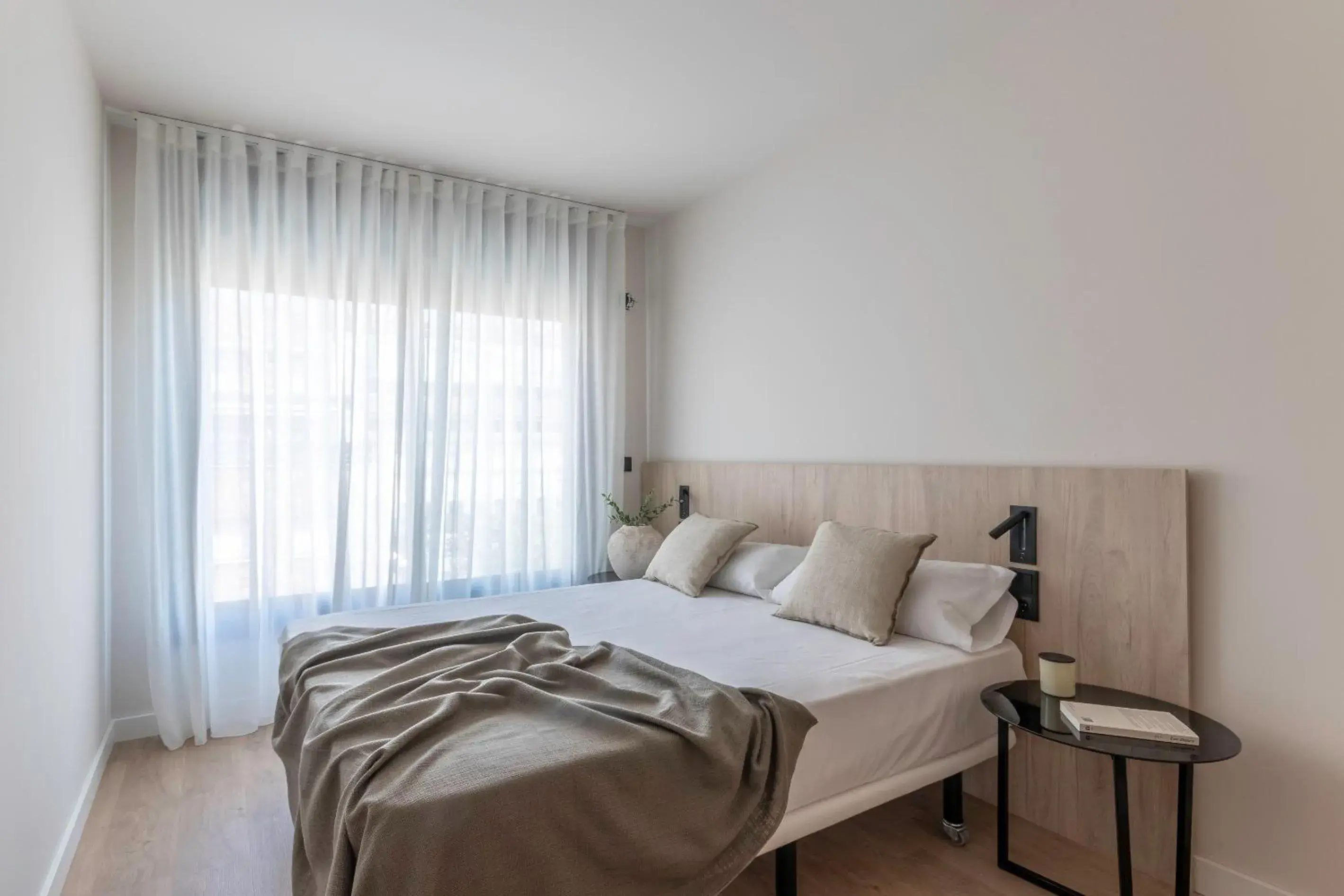 Bed in Apartamentos Líbere Pamplona Yamaguchi Bed in Apartamentos Líbere Pamplona Yamaguchi