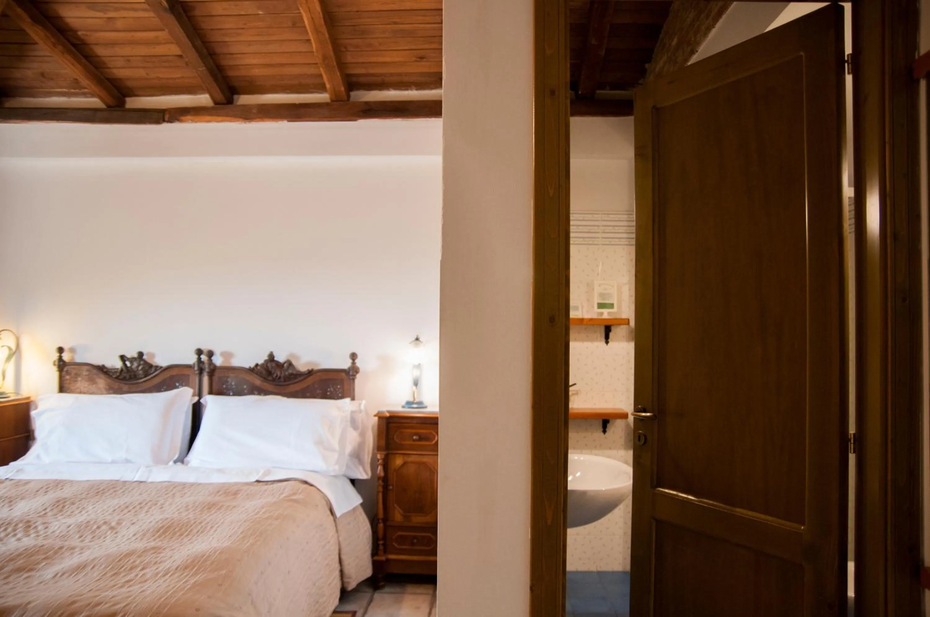 Bed in Antico Borgo Etneo Country Hotel