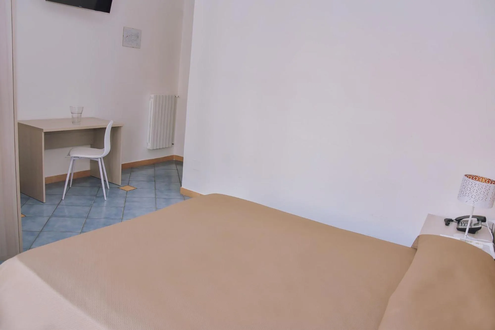 Bed in Hotel Piccolo Sogno