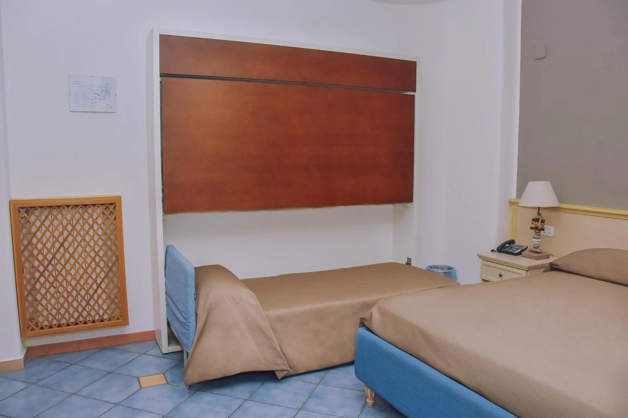 Bed in Hotel Piccolo Sogno