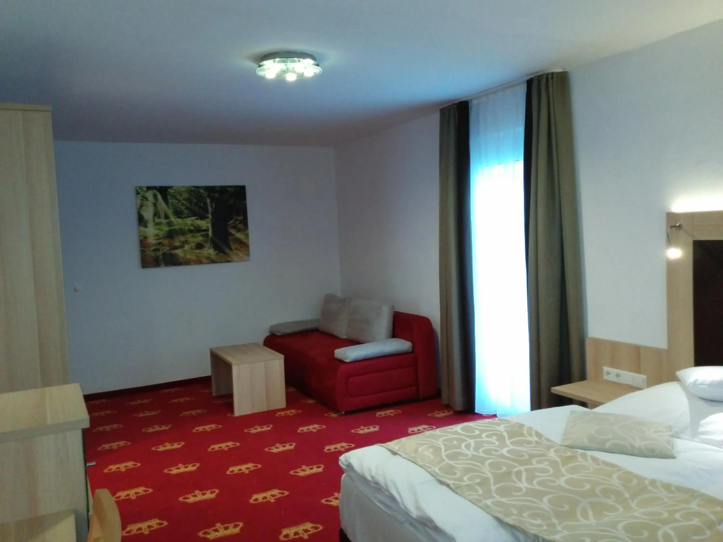 Photo of the whole room, Bed in Wellness Hotel Garni Krone