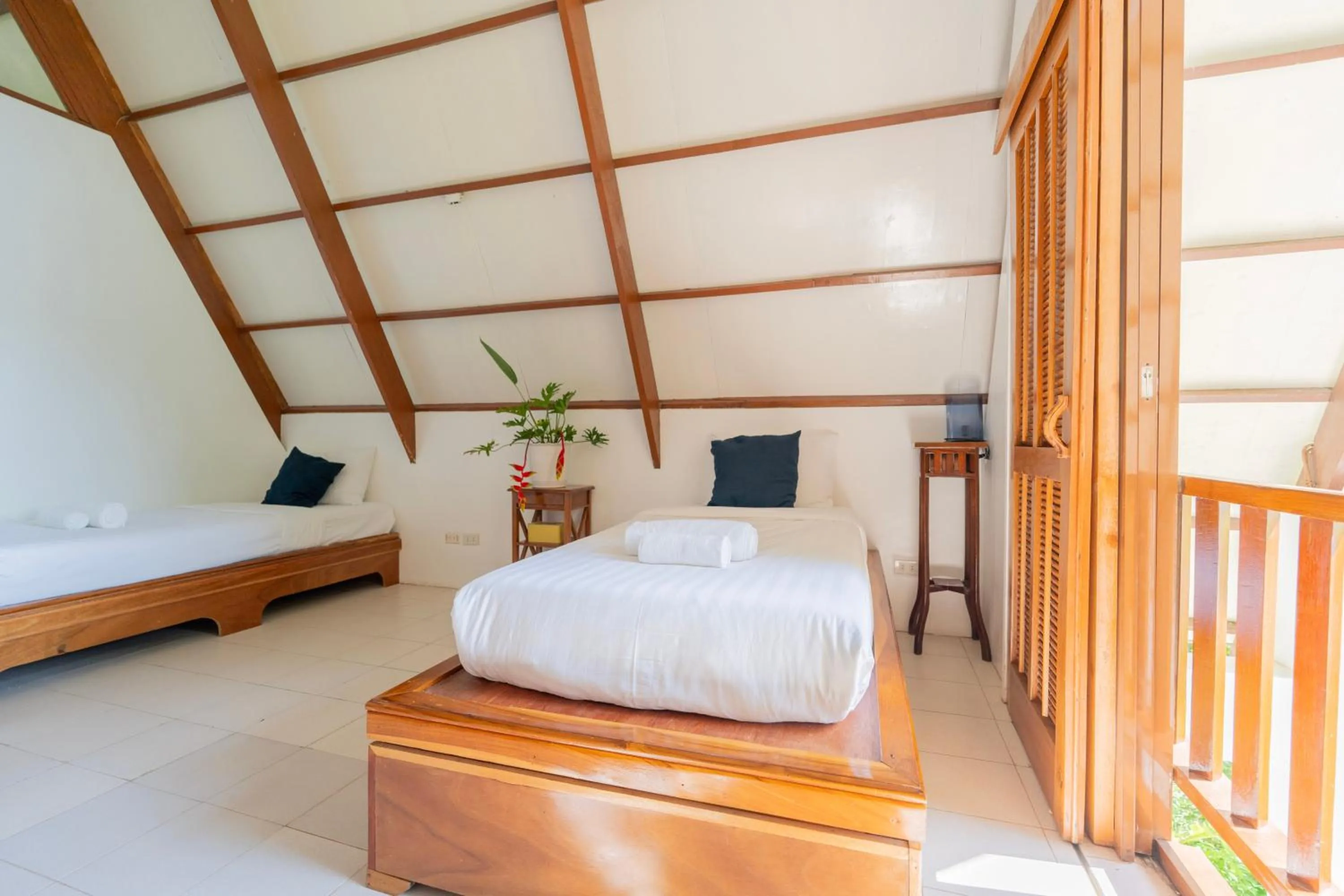 Bed in Casalay Boutique Villas & Dive