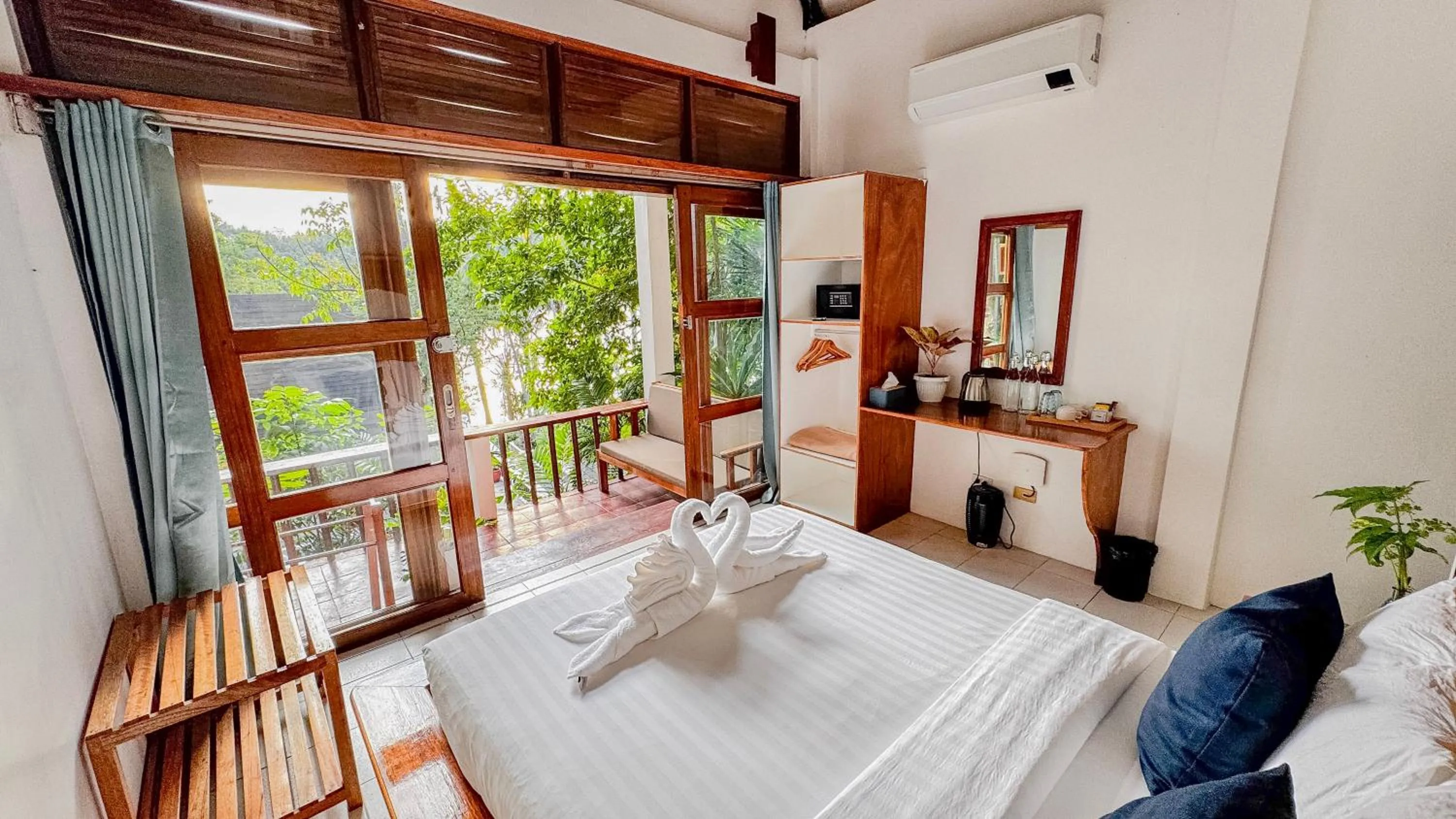 Bed in Casalay Boutique Villas & Dive