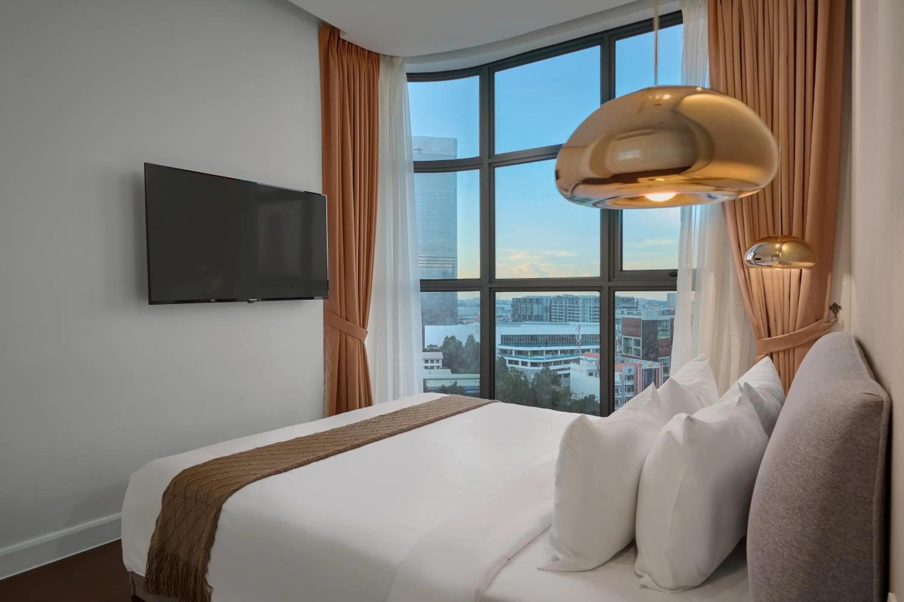 Bed in The Peninsula Phnom Penh