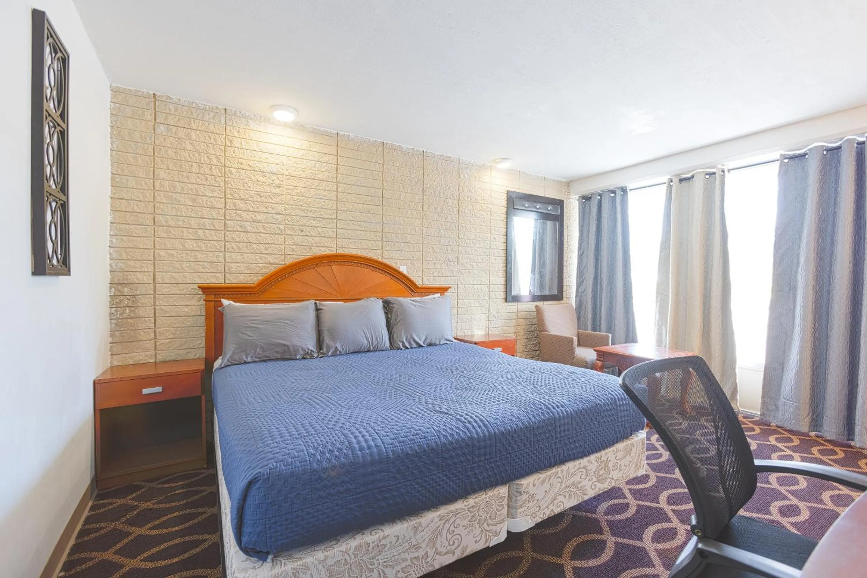 Bedroom, Bed in Sonrise Inn Lincoln Hwy By OYO