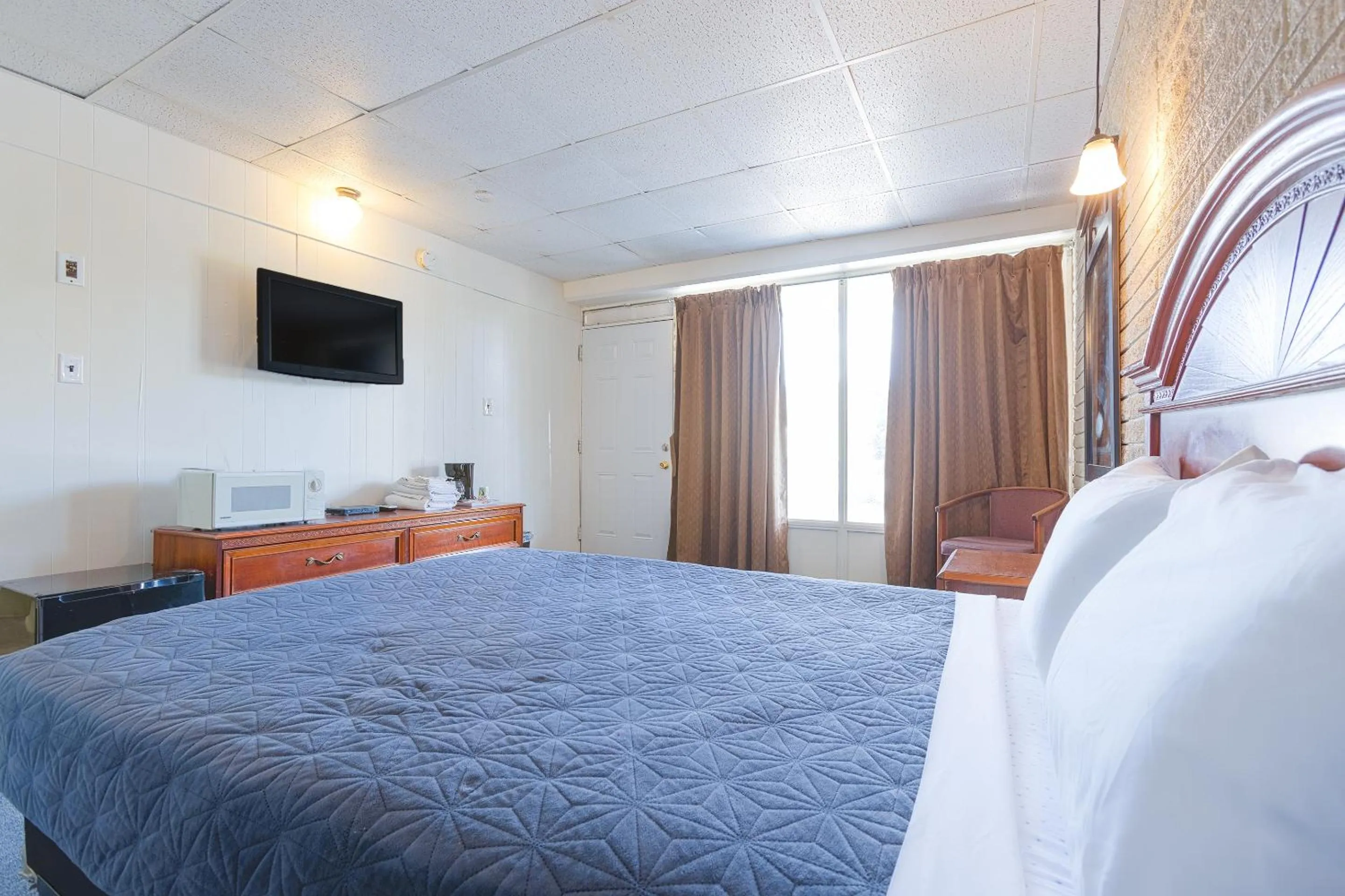 Bedroom, Bed in Sonrise Inn Lincoln Hwy By OYO