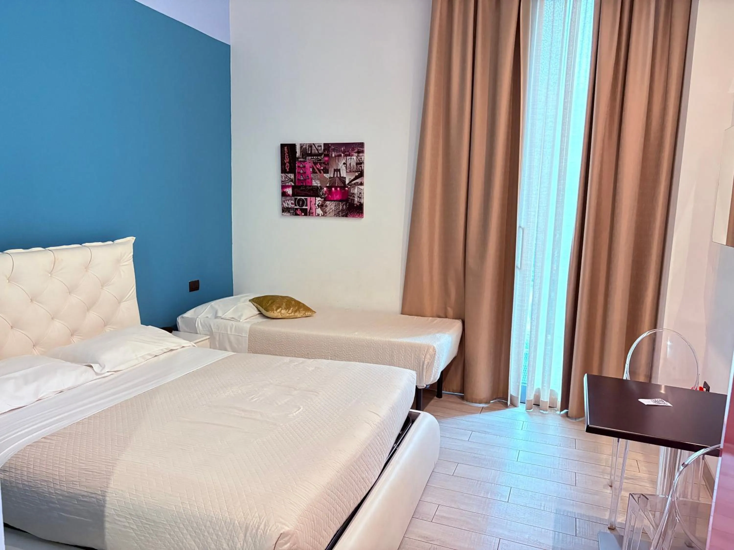 Bed in Blue Shades Hotel