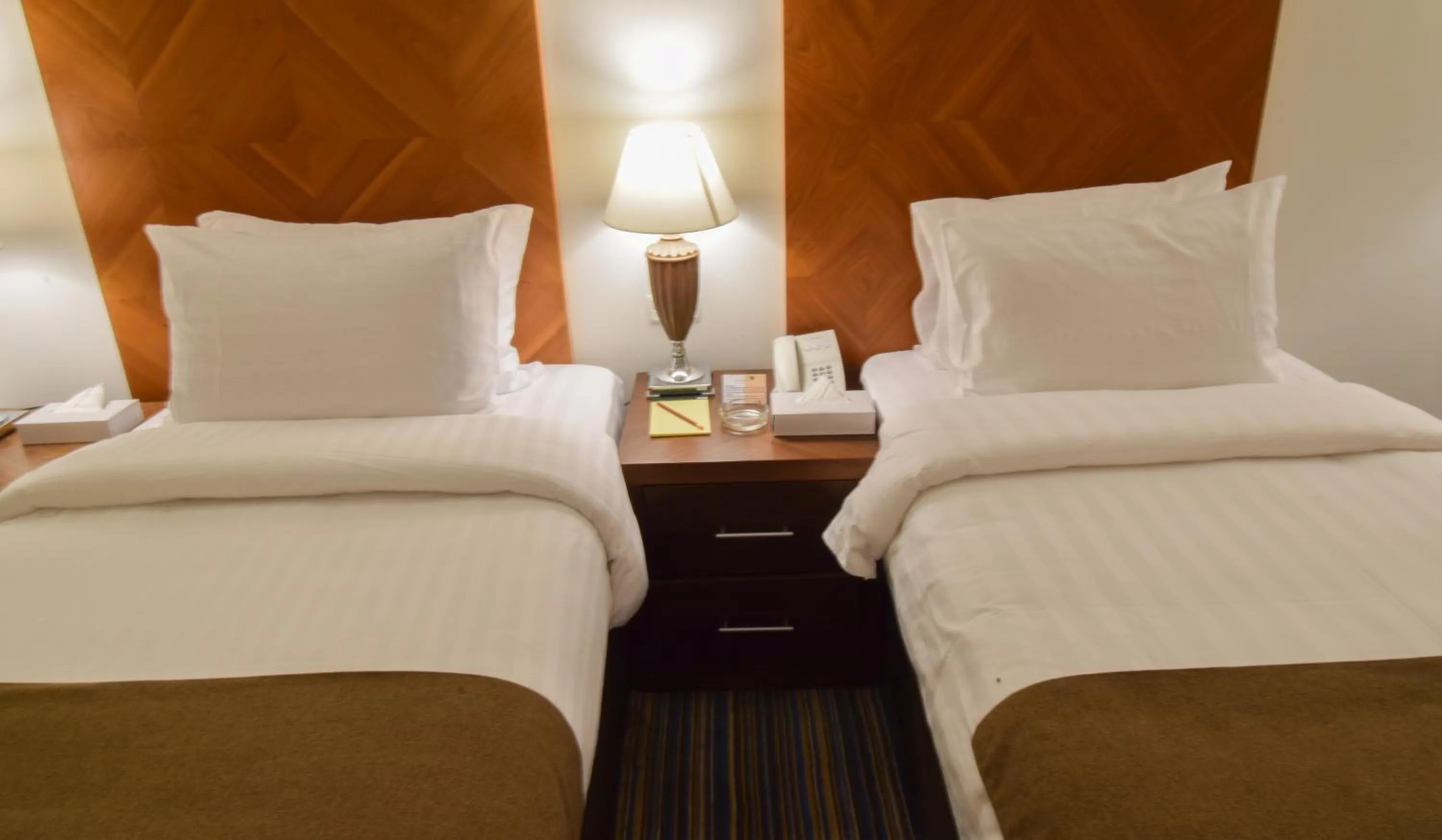 Bed in Al Massa Grand Hotel