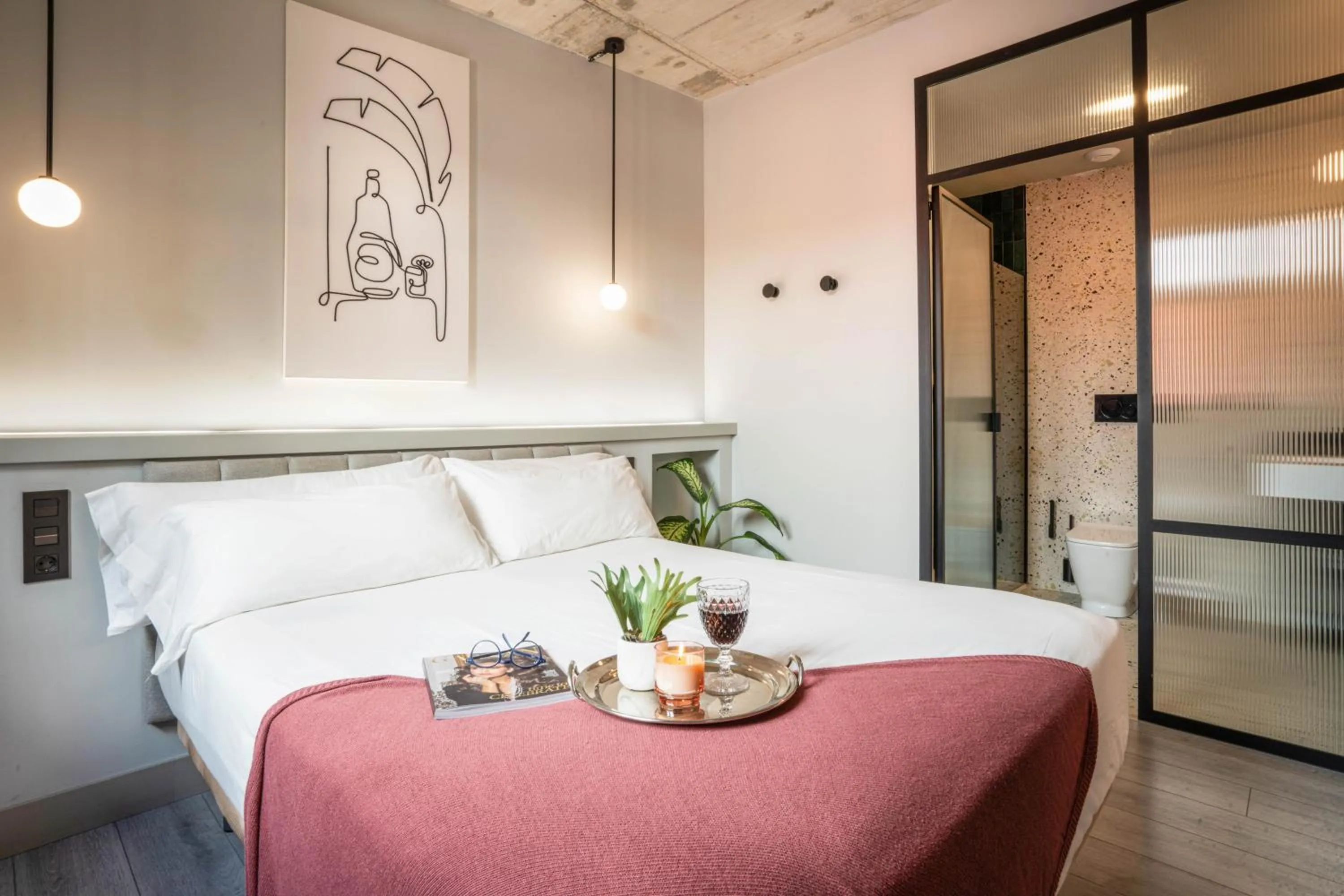 Bed in Coeo Parras Design Apartments