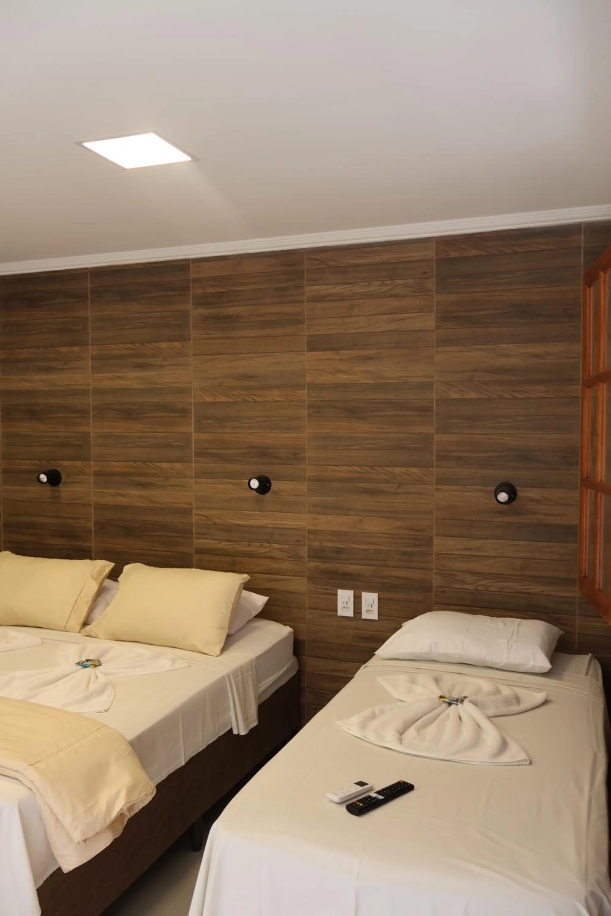 Bed in Pousada Alicia