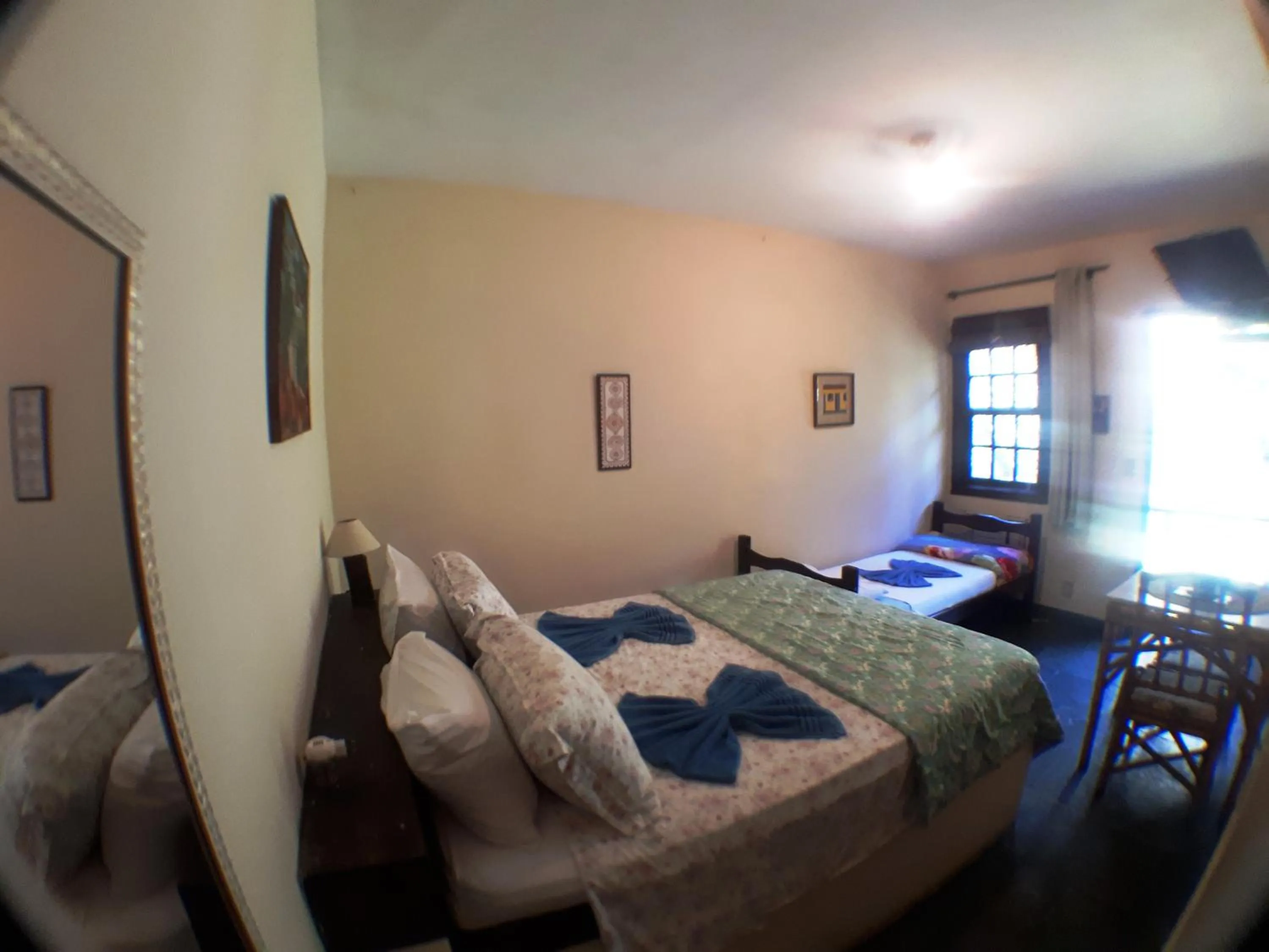 Photo of the whole room, Bed in Pousada Alicia