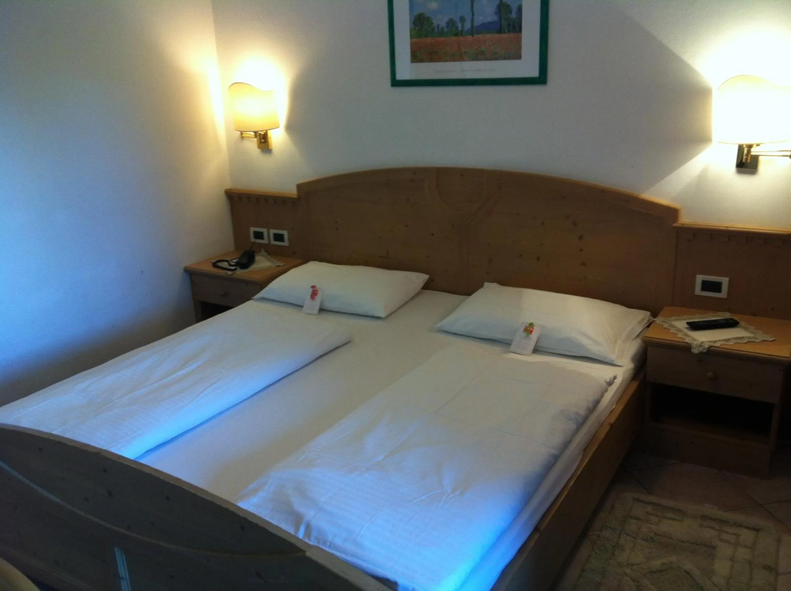 Bed in Piccolo Hotel Sciliar