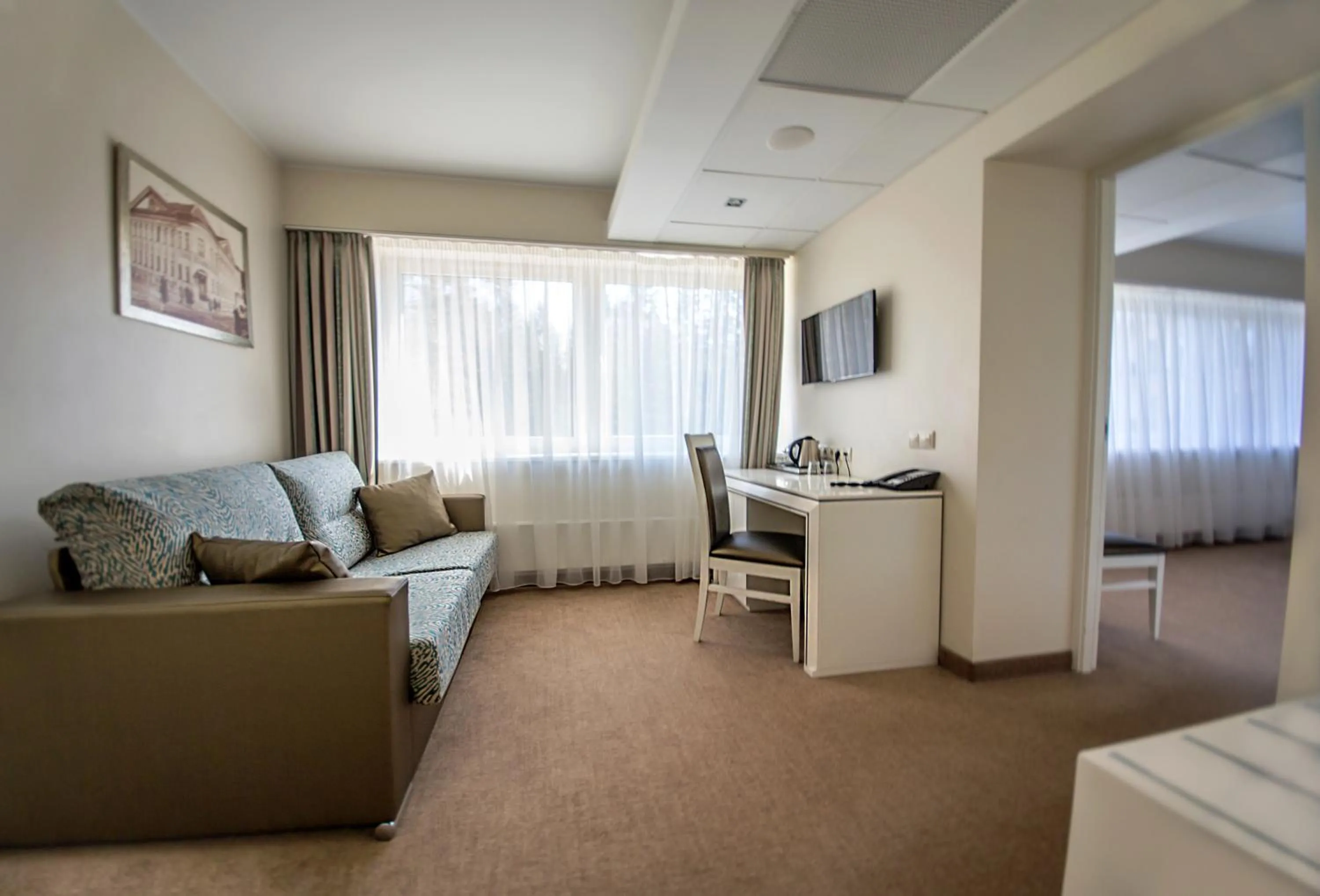 Communal lounge/ TV room in Noorus SPA Hotel