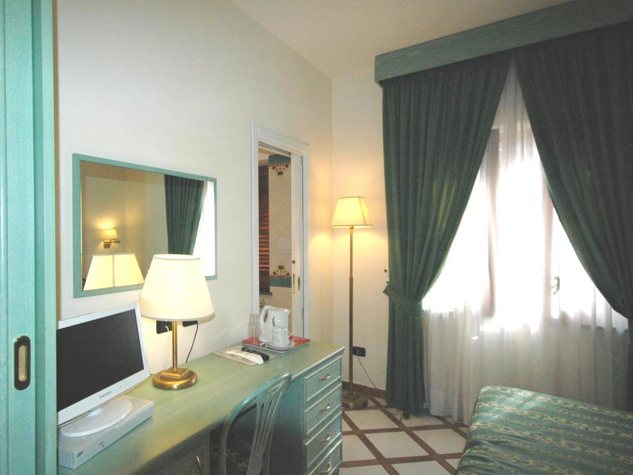 Decorative detail, Bed in Residence Villaggio Verde