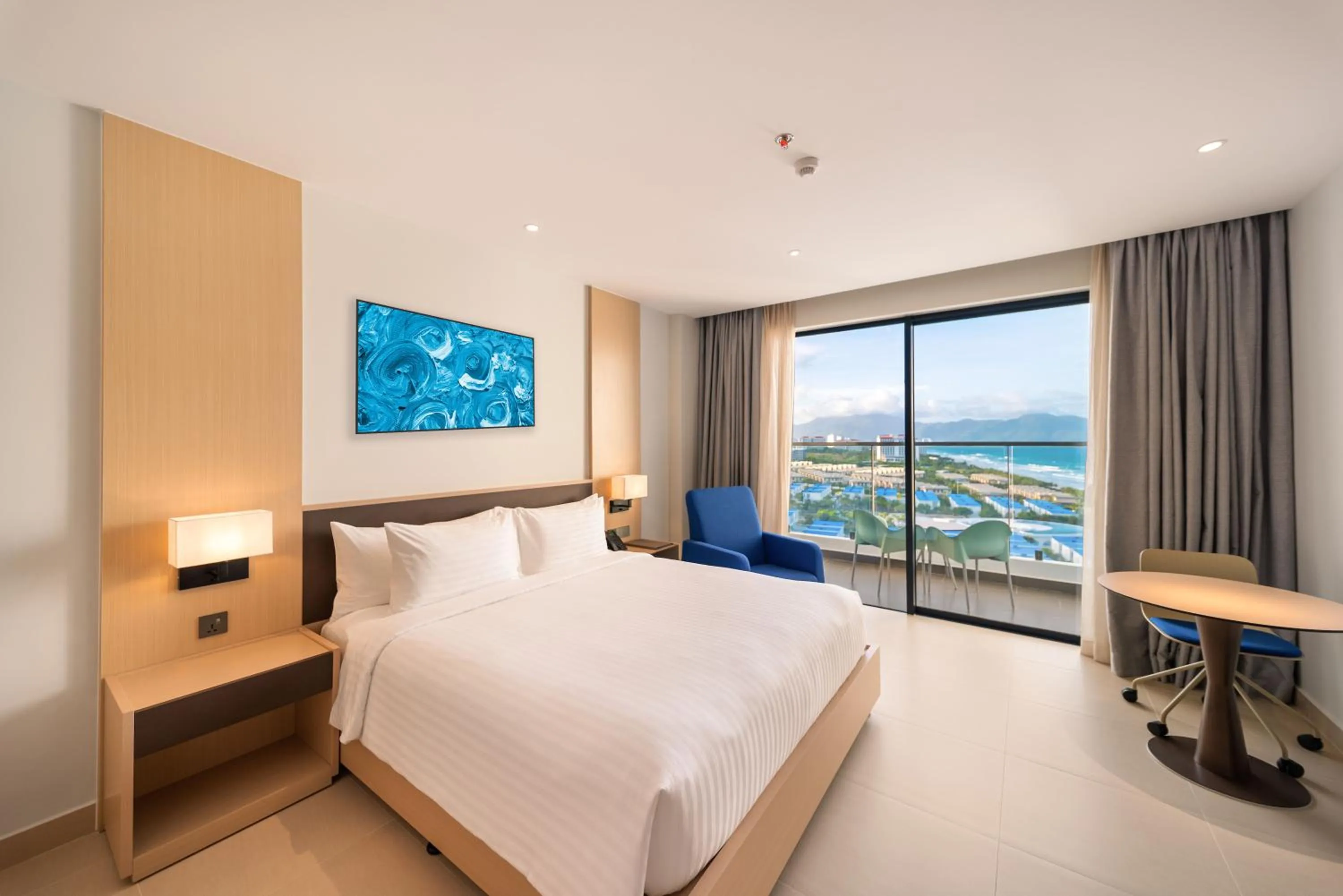 Bed in The Empyrean Cam Ranh Beach Resort