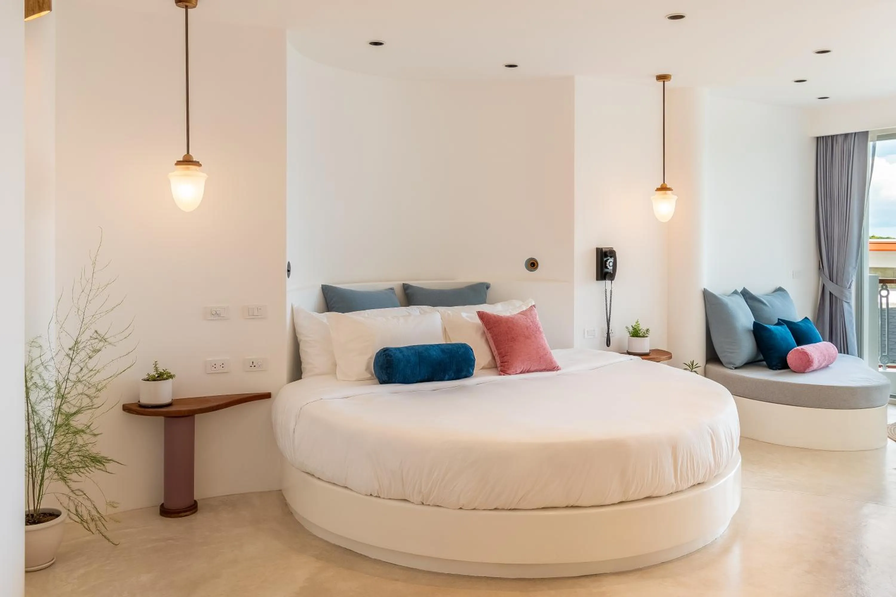 Bed in Ampersand Resort