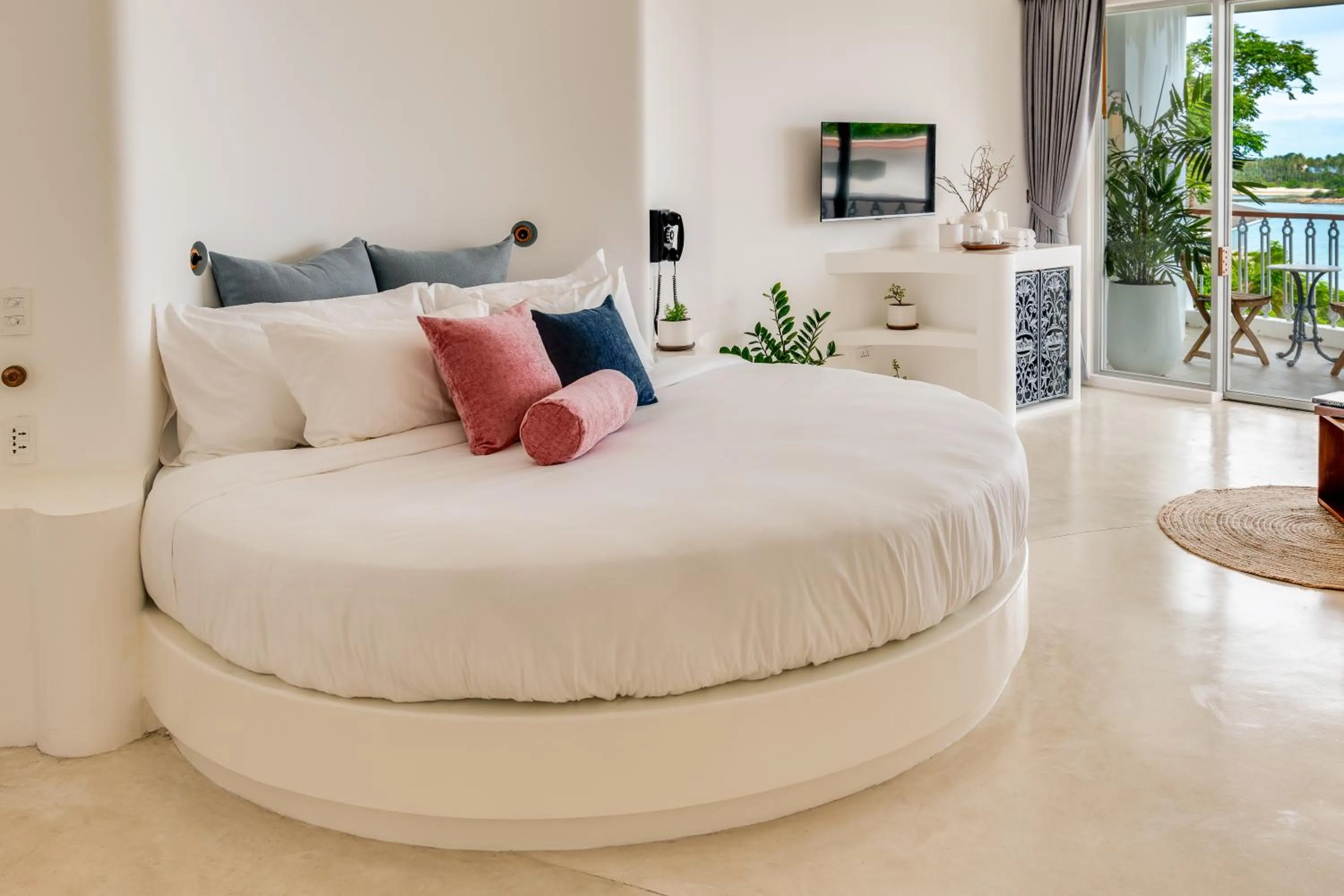 Bed in Ampersand Resort