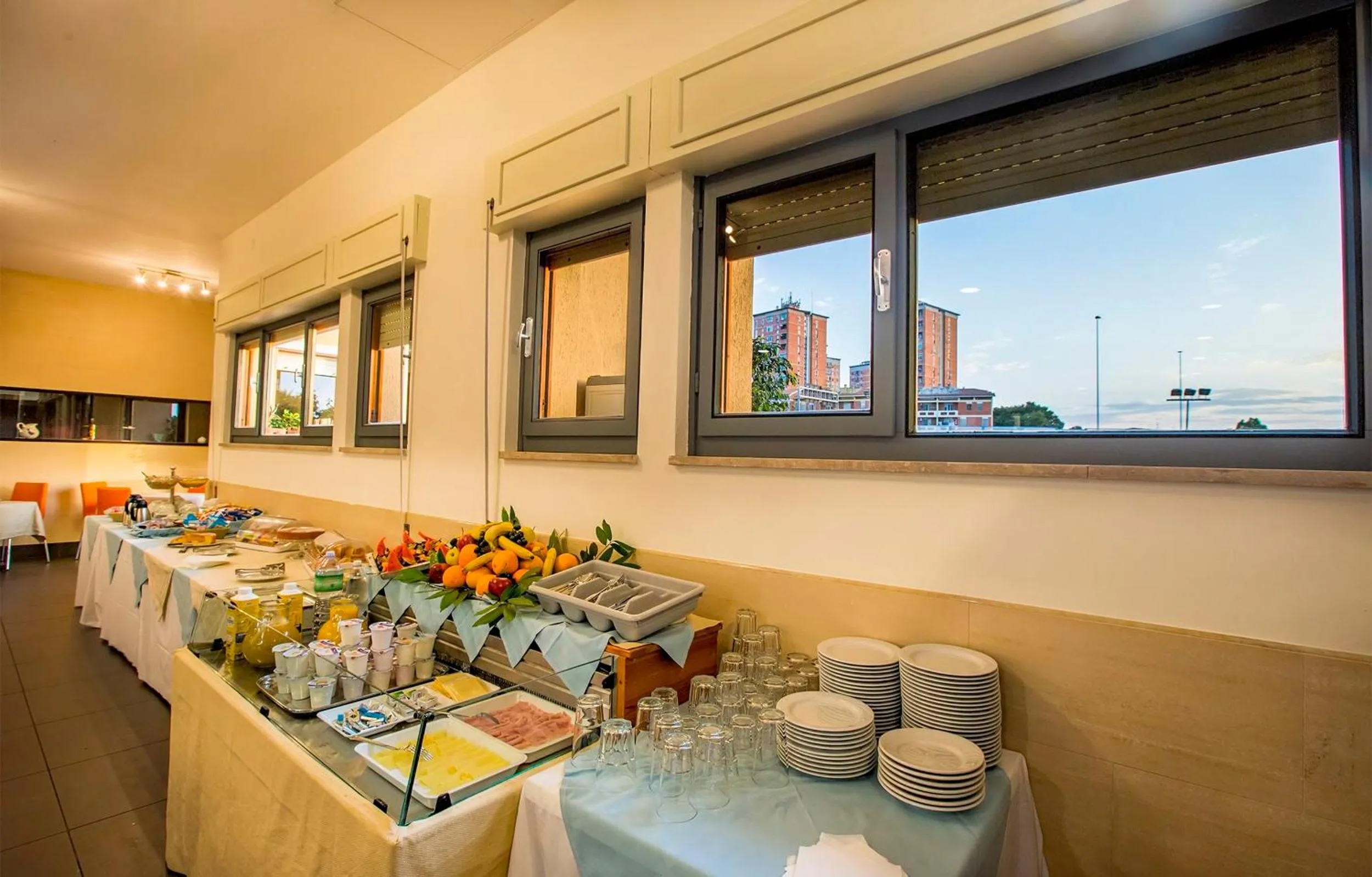 Communal lounge/ TV room in Hotel Residence Ulivi E Palme