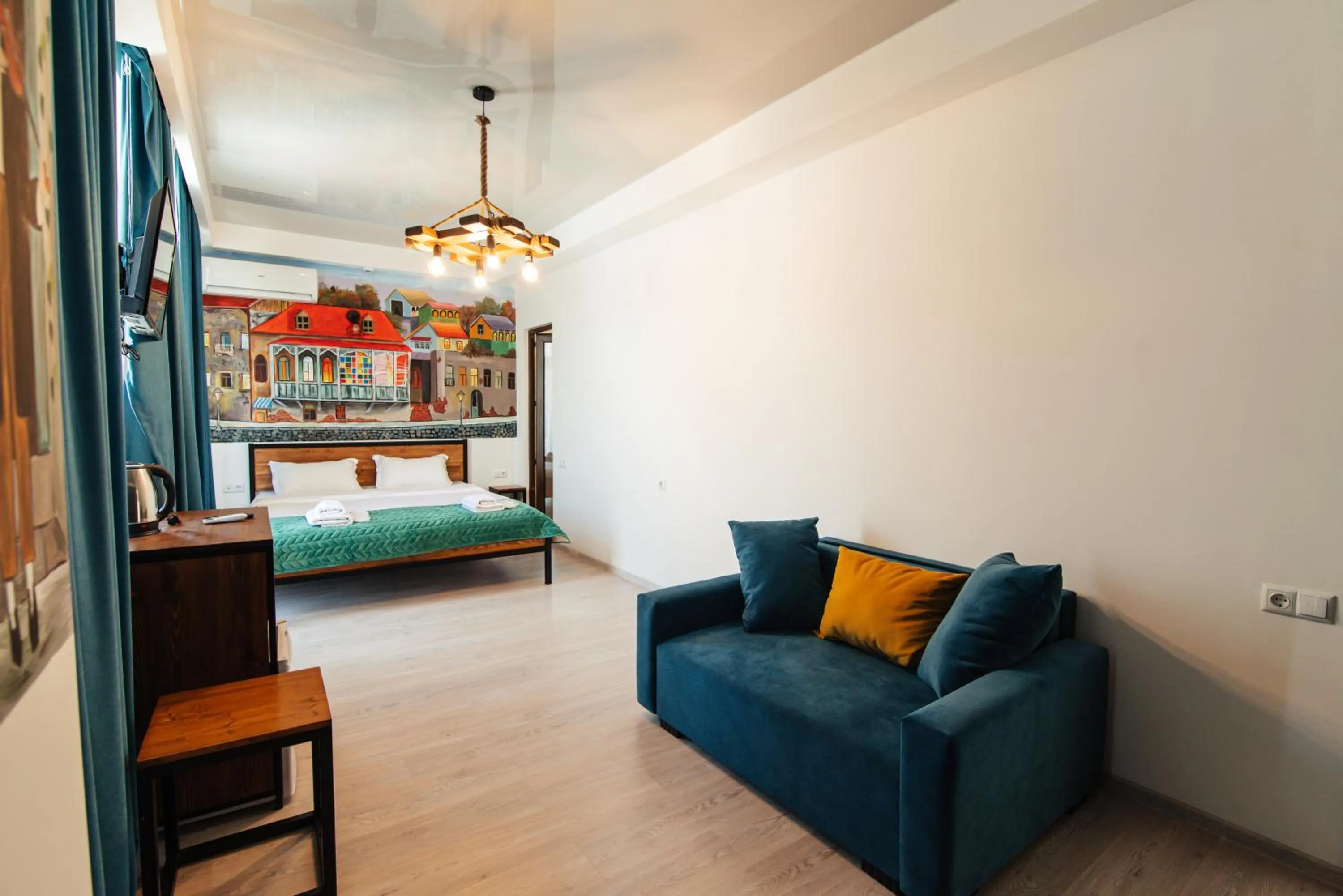 Living room, Bed in Hotel Boutique George