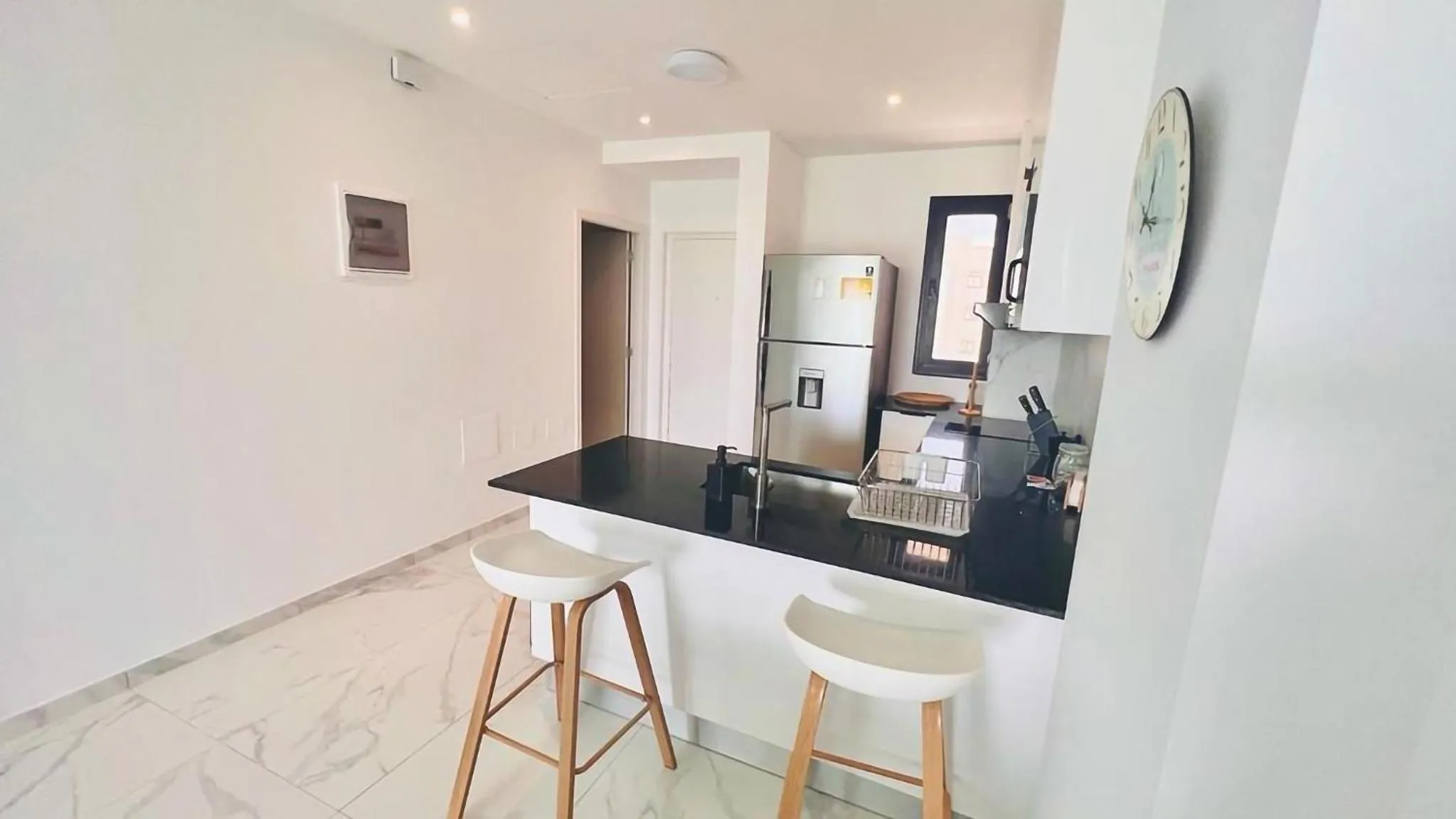kitchen in Luxury Apartment With Pool And Golf View