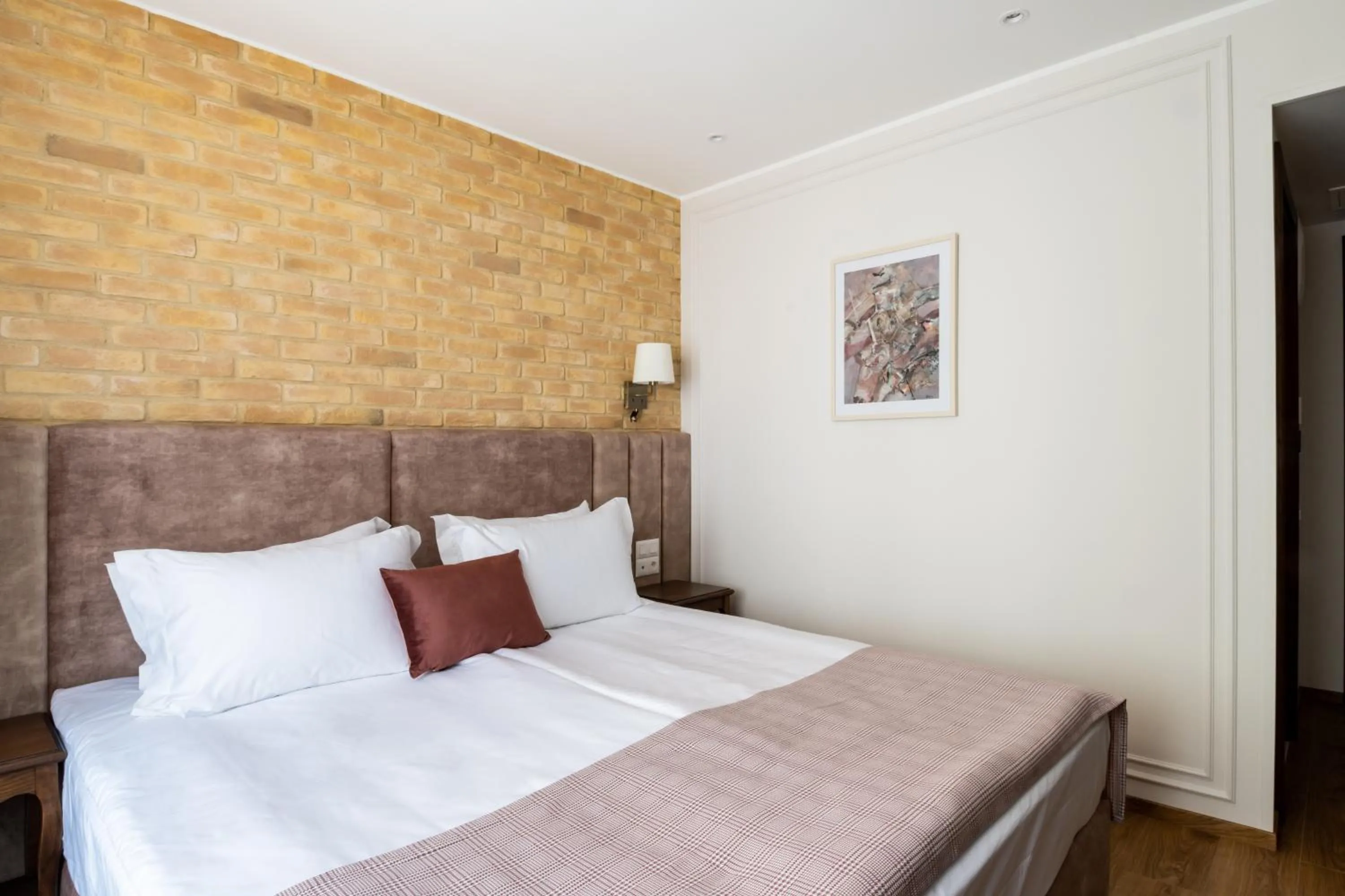 Bed in Villa Flavia Heritage Boutique Hotel