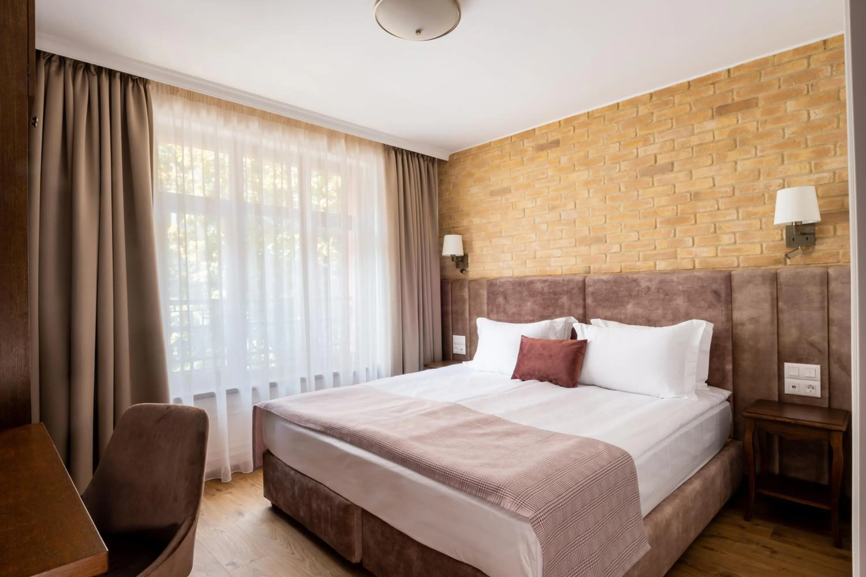 Bed in Villa Flavia Heritage Boutique Hotel