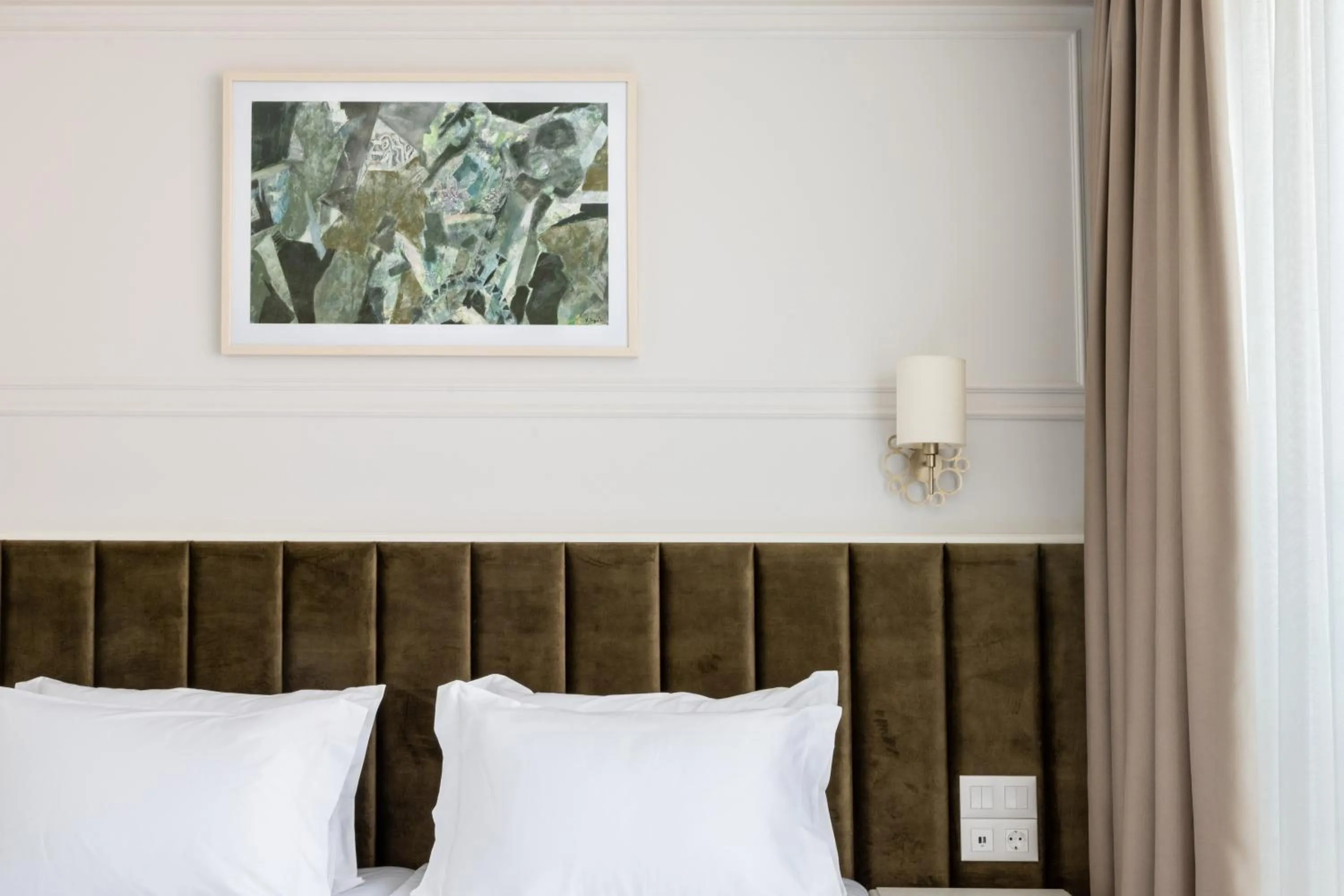 Bed in Villa Flavia Heritage Boutique Hotel