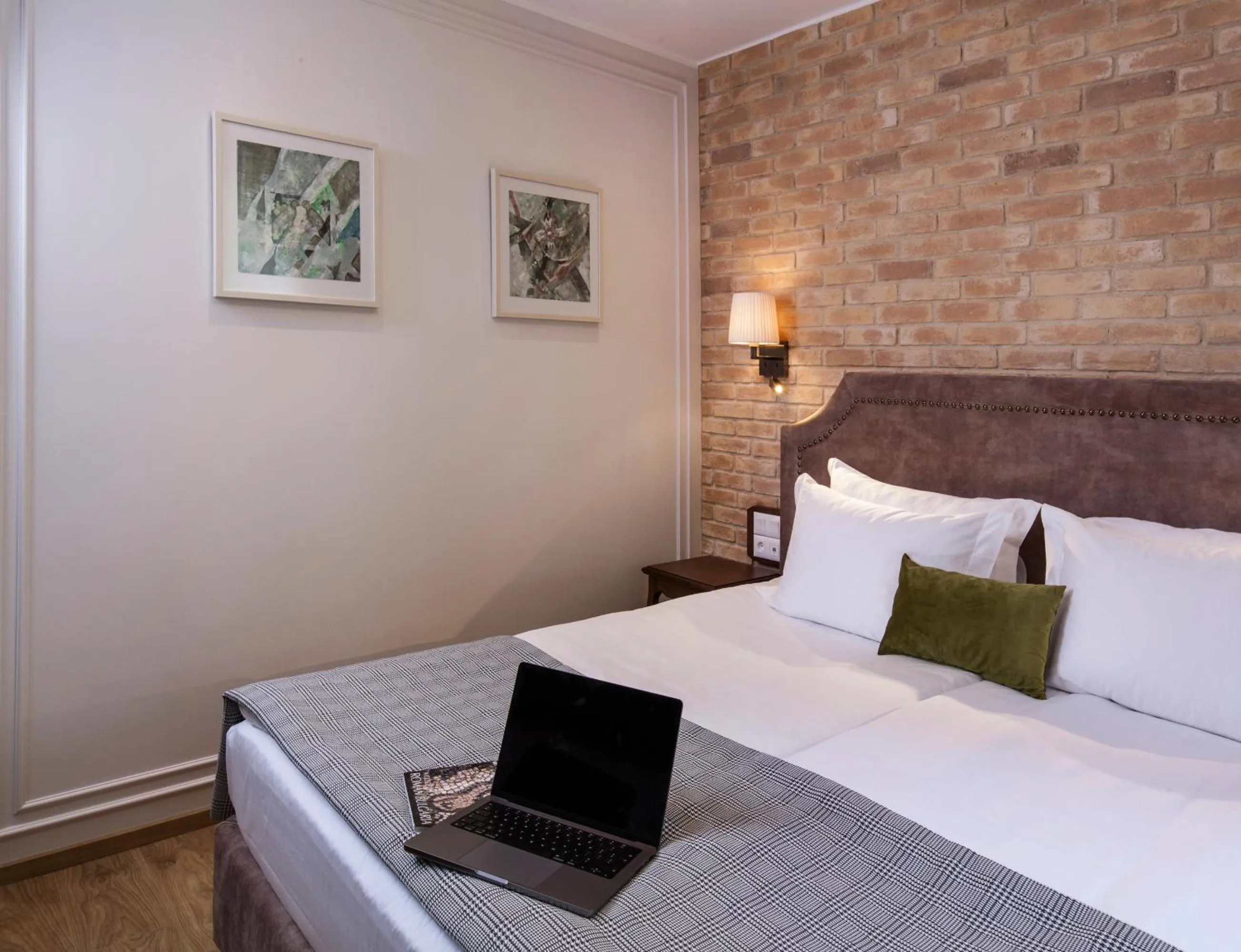 Bed in Villa Flavia Heritage Boutique Hotel