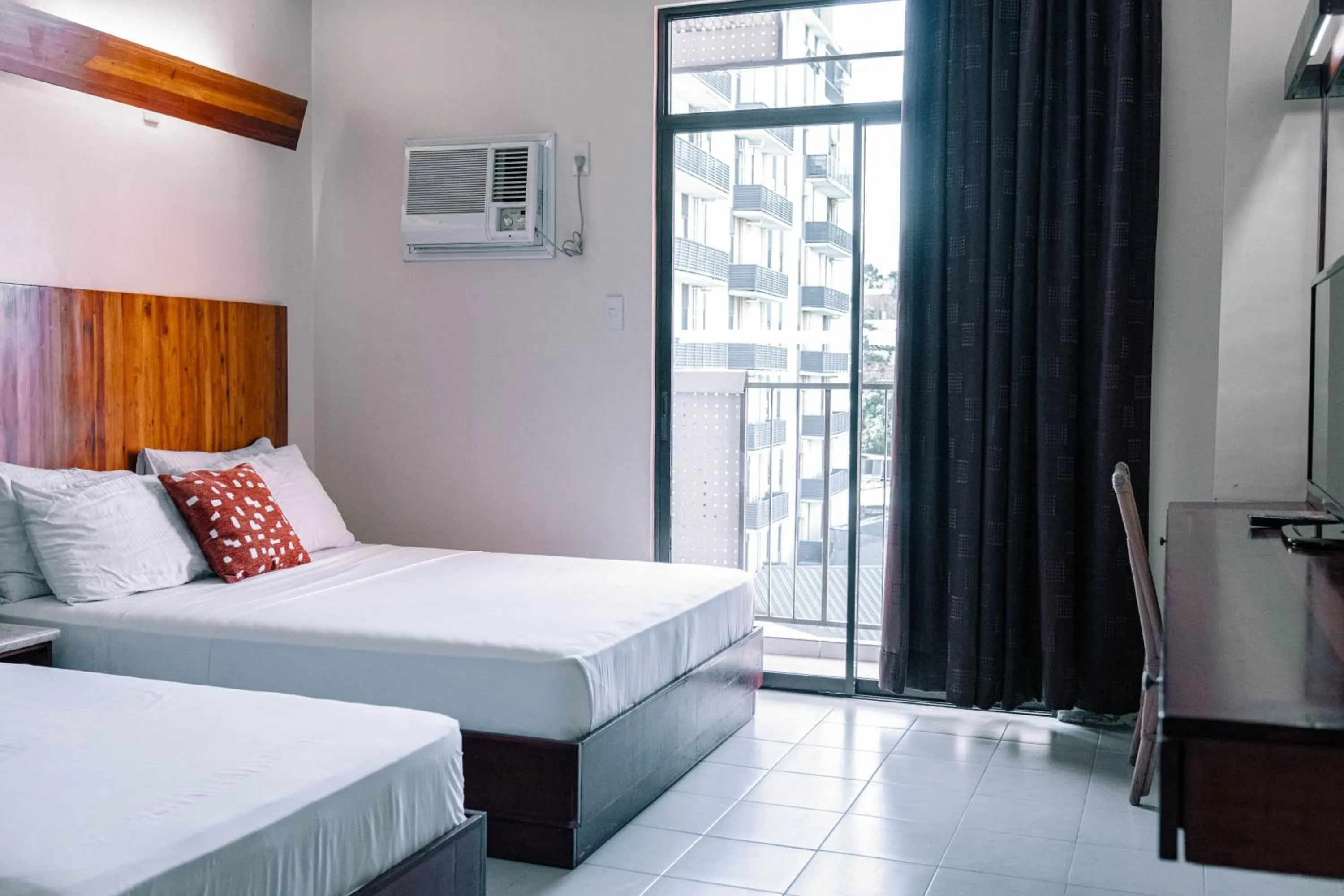 Bed in Tsai Hotel and Residences