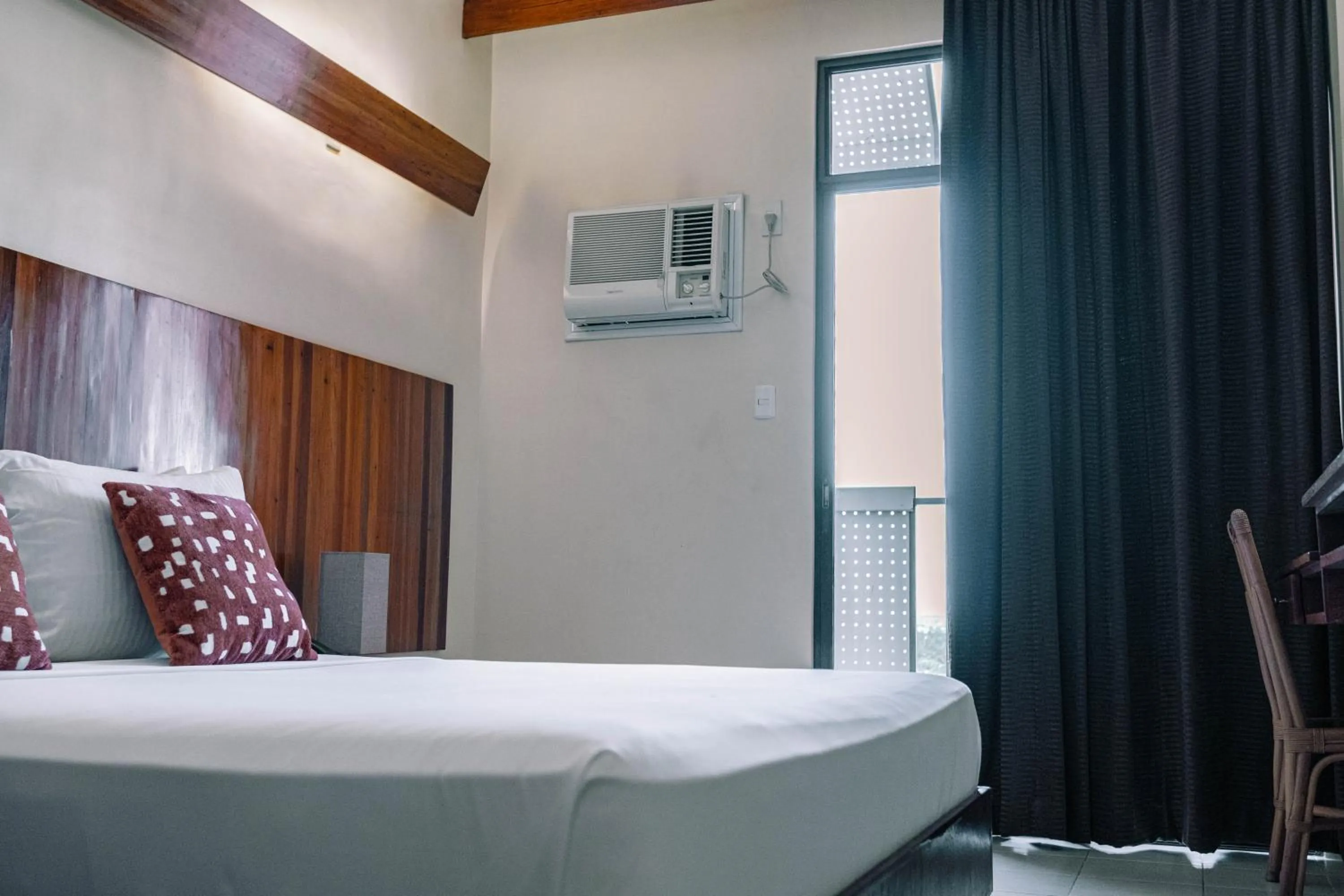 Bed in Tsai Hotel and Residences