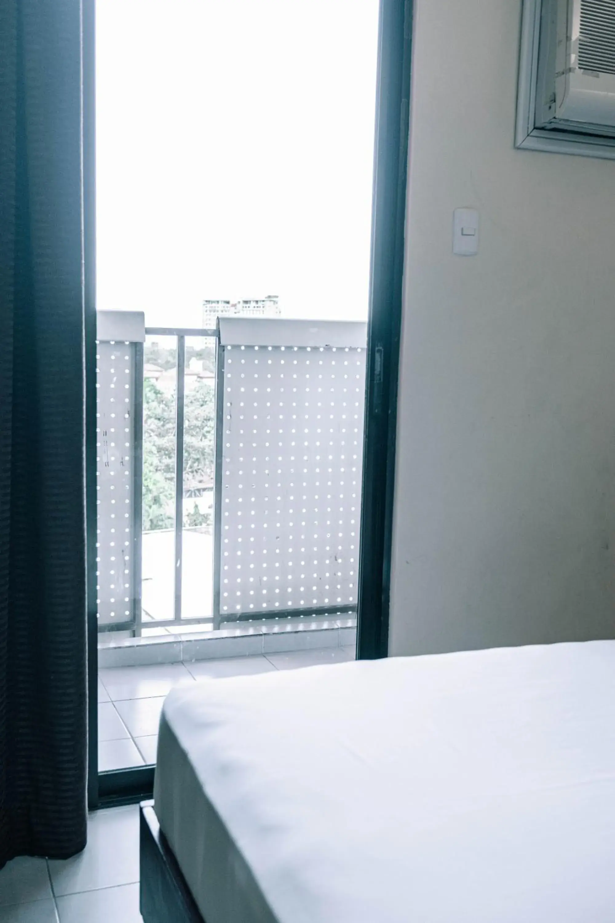 Bed in Tsai Hotel and Residences Bed in Tsai Hotel and Residences