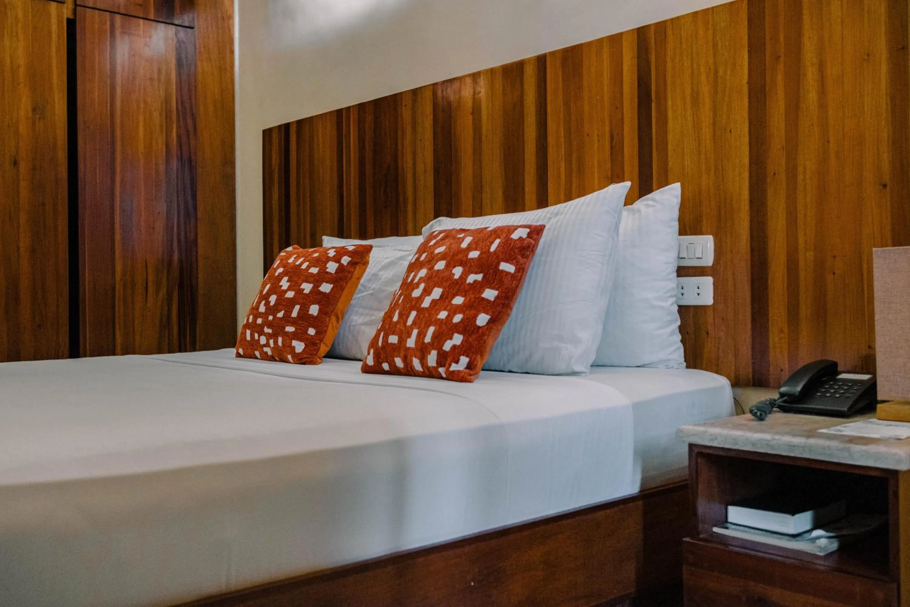 Bed in Tsai Hotel and Residences