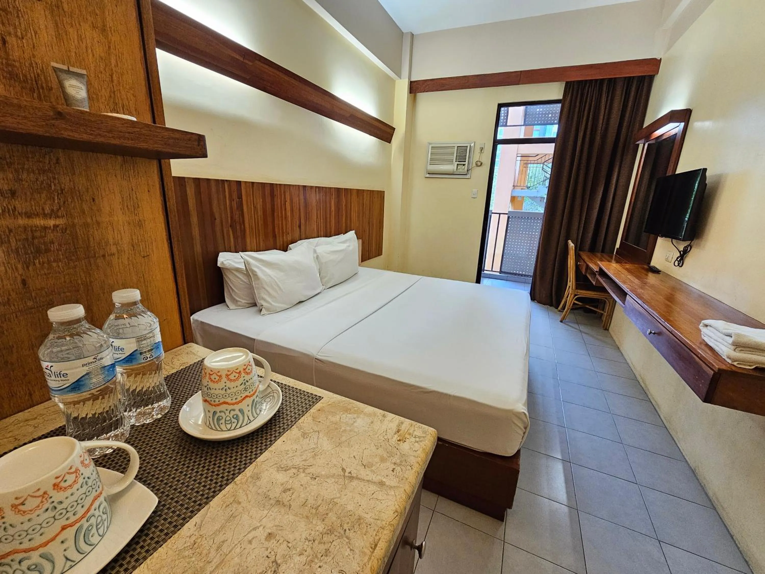 Bed in Tsai Hotel and Residences