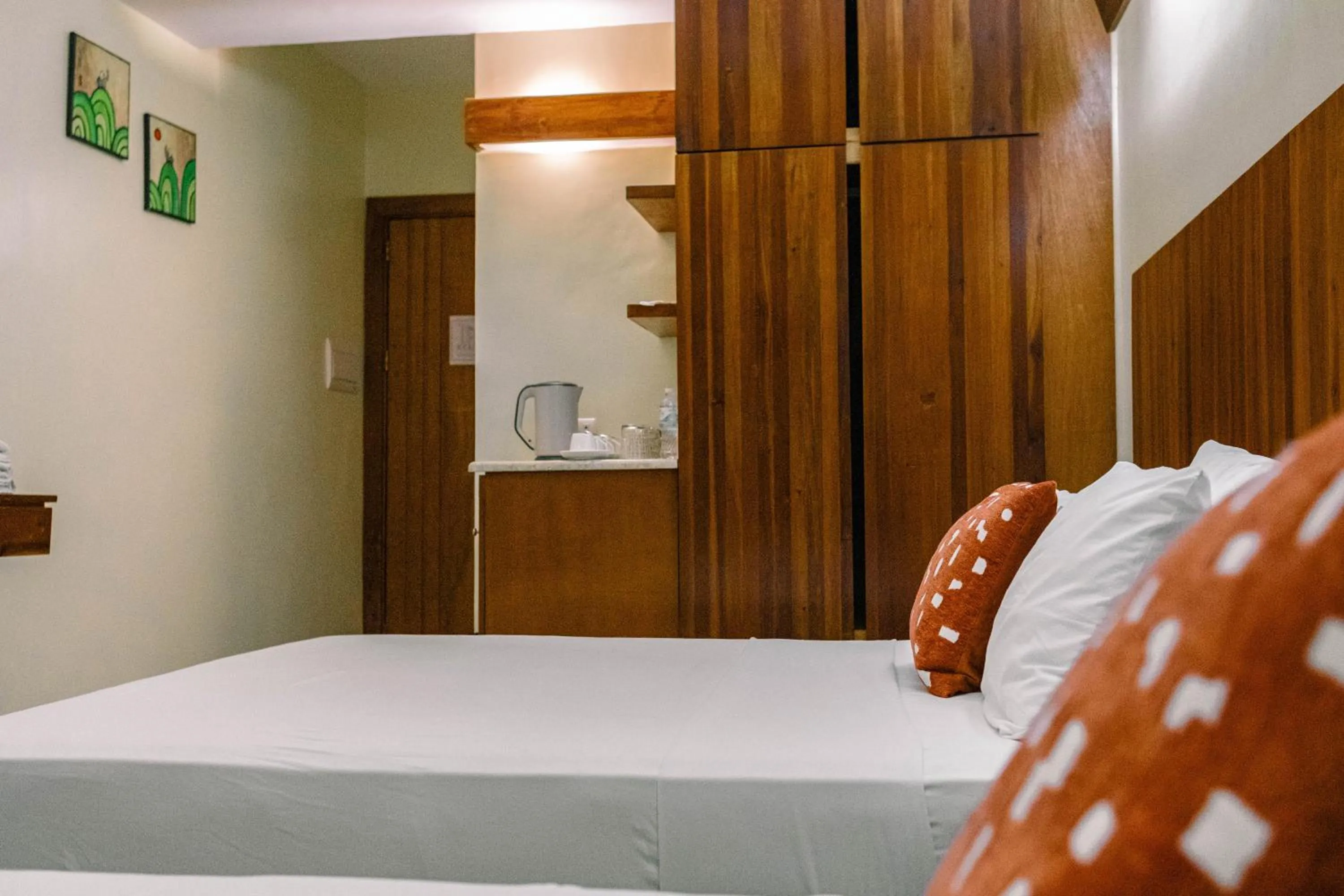 Bed in Tsai Hotel and Residences