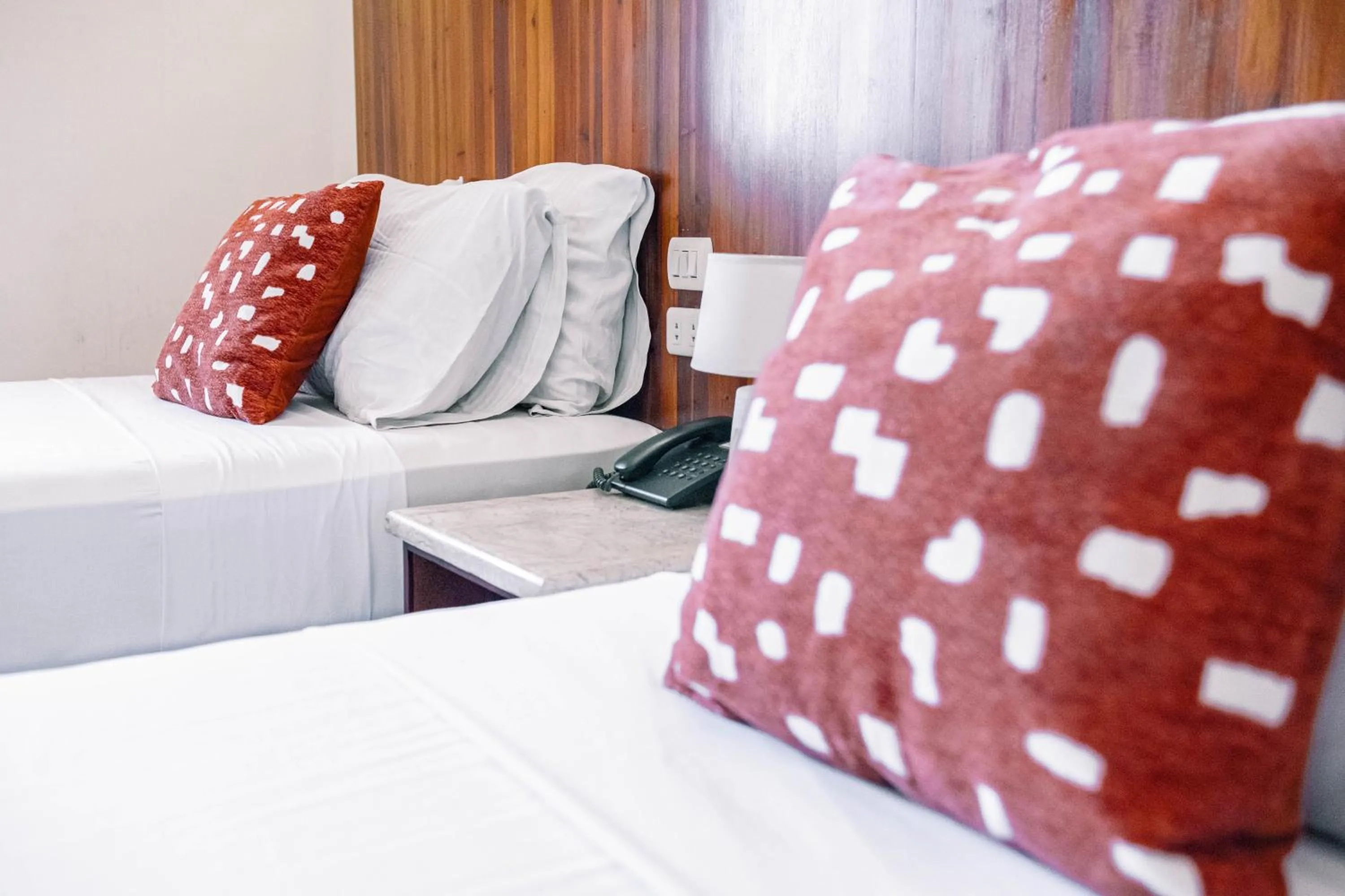 Bed in Tsai Hotel and Residences