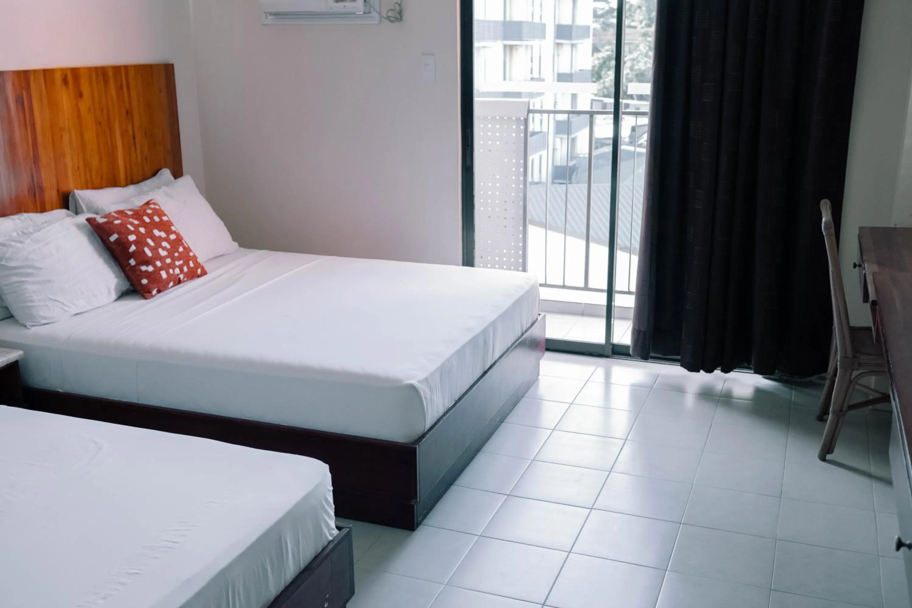 Bed in Tsai Hotel and Residences