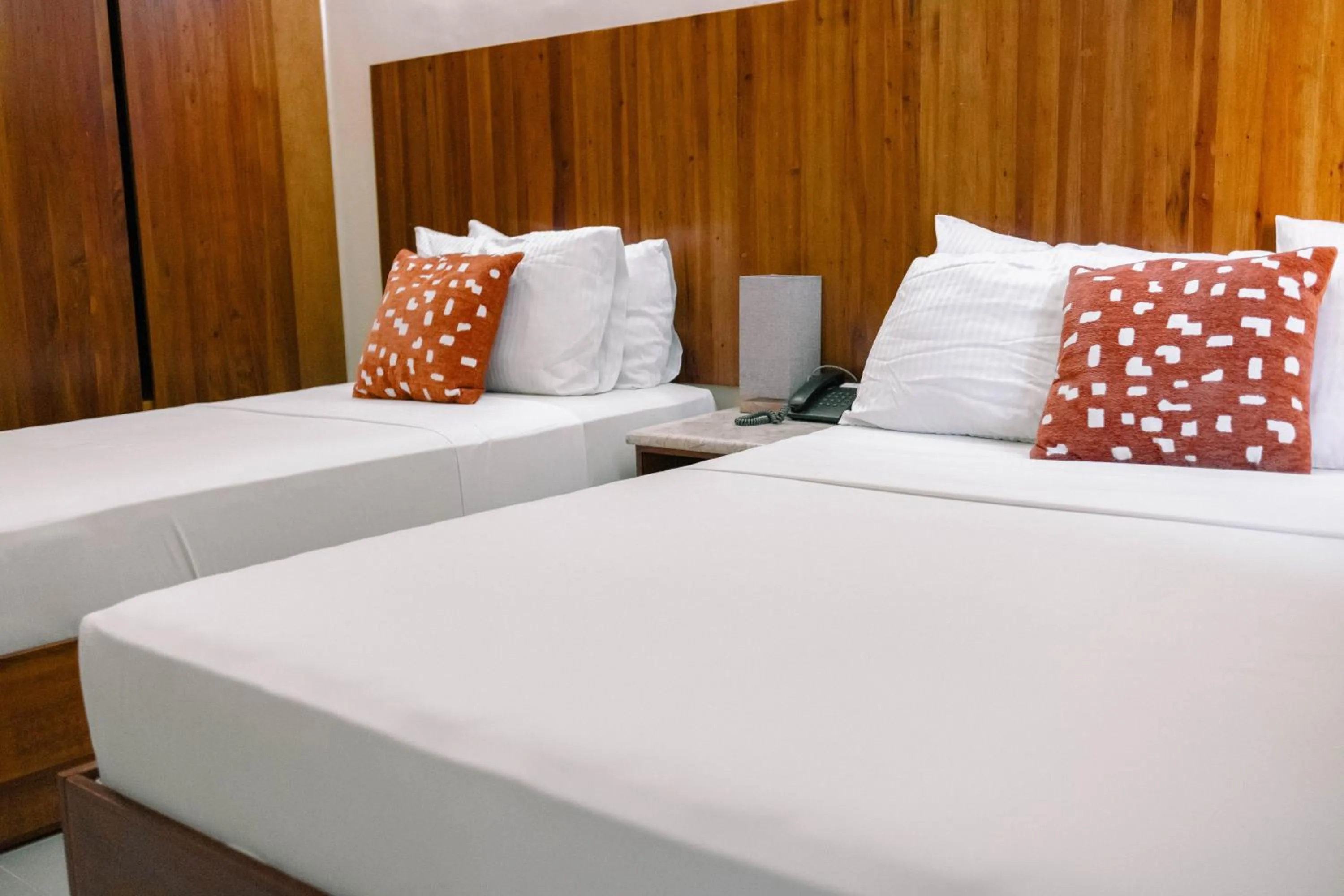 Bed in Tsai Hotel and Residences