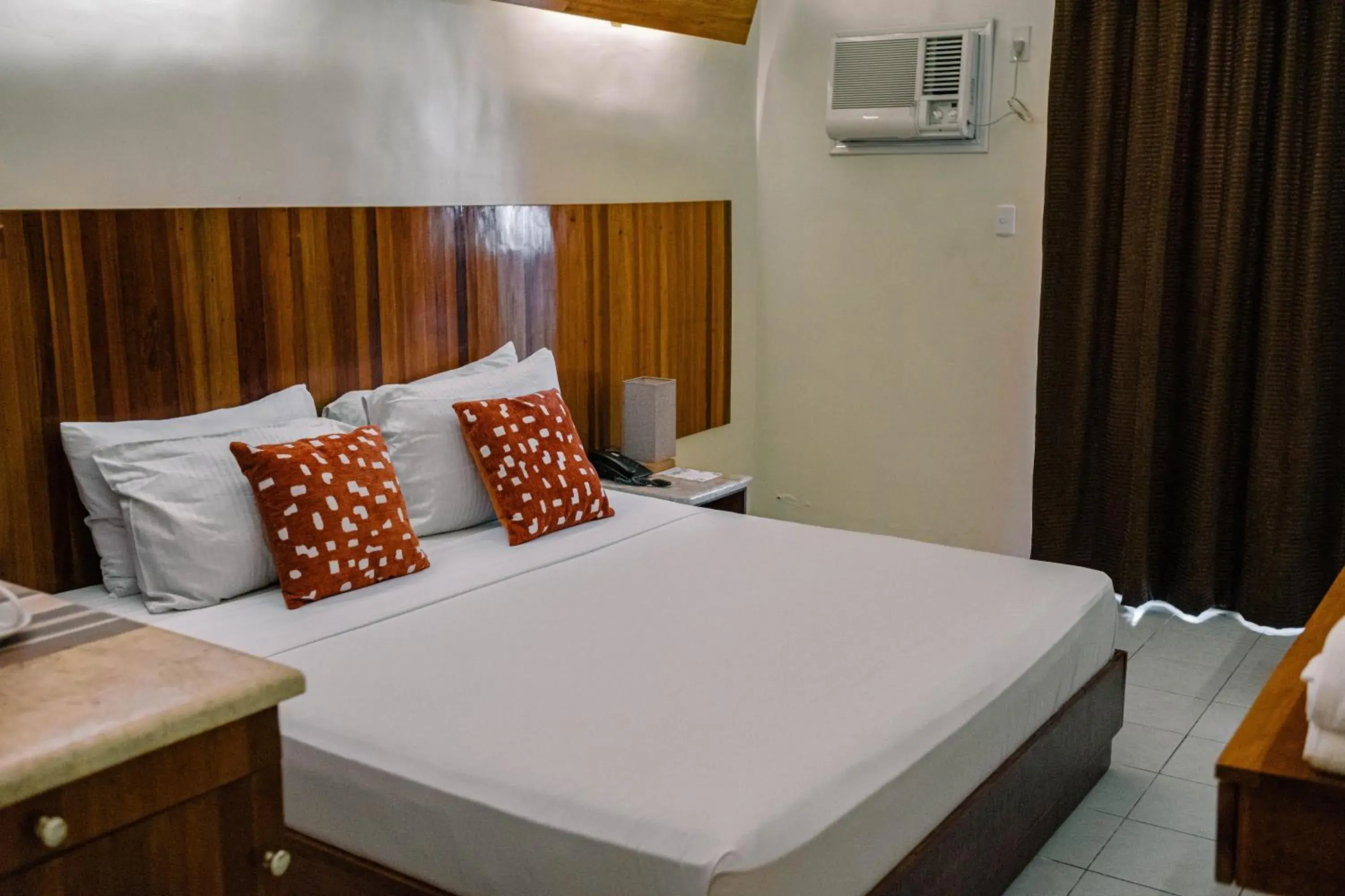 Bed in Tsai Hotel and Residences Bed in Tsai Hotel and Residences