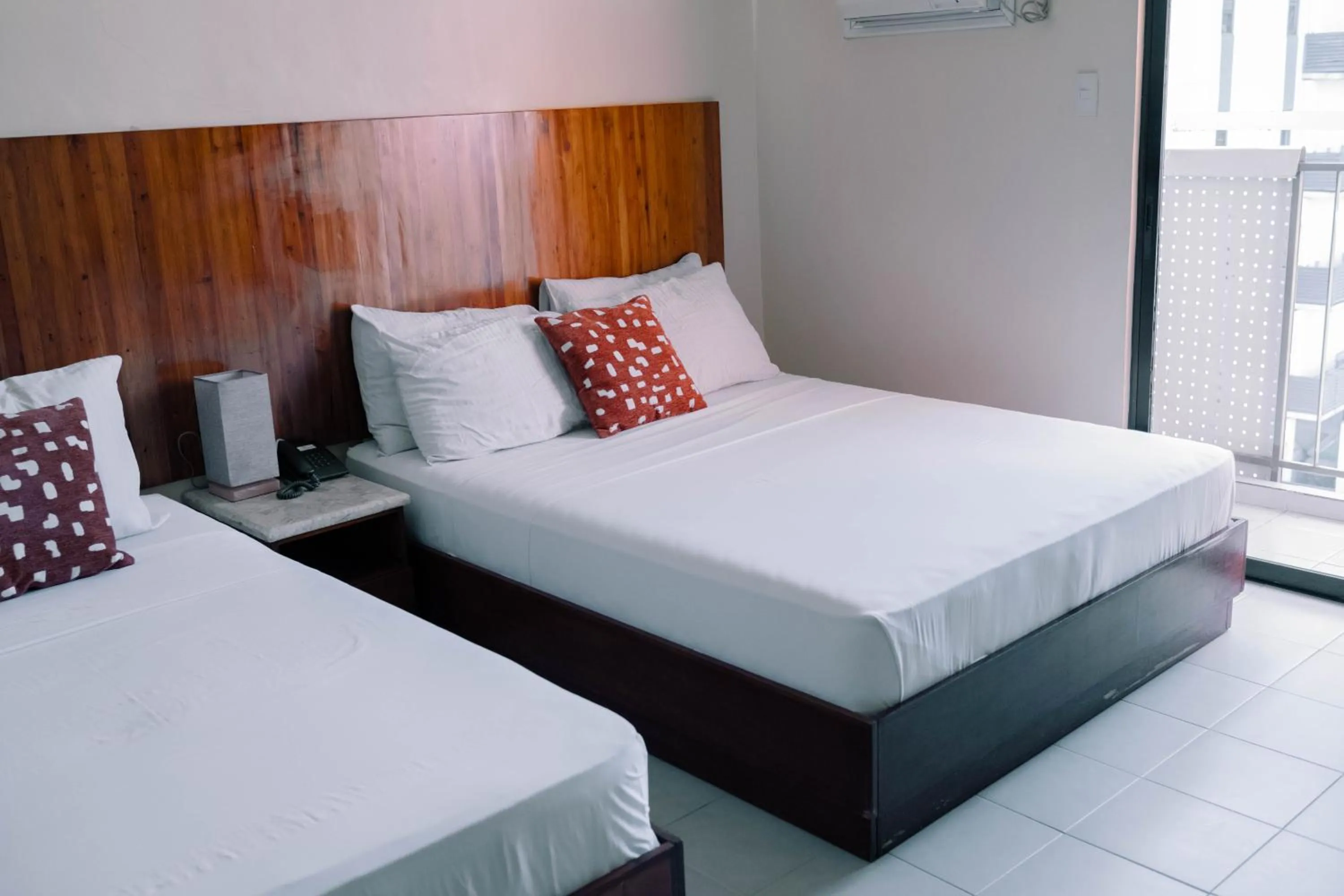 Bed in Tsai Hotel and Residences